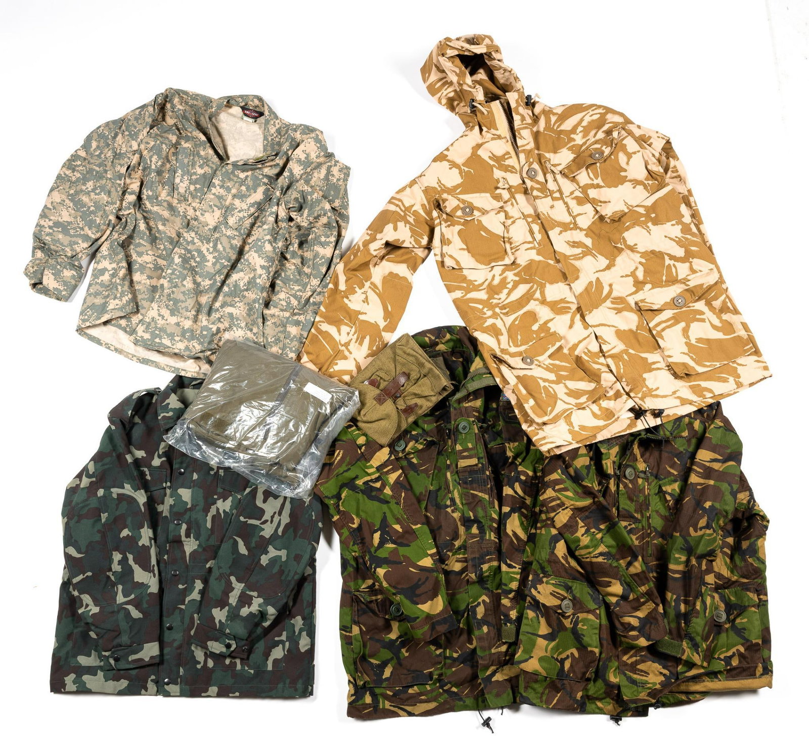 5 Military Coats & 1 Pr. Overpants: German winter overpants still in packaging, size XL. Coat sizes 42; 190/112; 160/96; and 180/104. One coat with no tags.