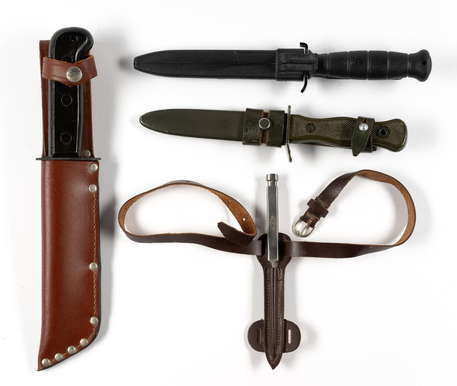 3 Knives & Pin Punch: First blade marked Glock Made in Austria; second blade marked Rostfrei Solingen; and third blade marked 12-8214 JR1988. Pin punch marked H.G. Longag. Knives overall 10-1/4" to 12-1/2" long. Blades mea