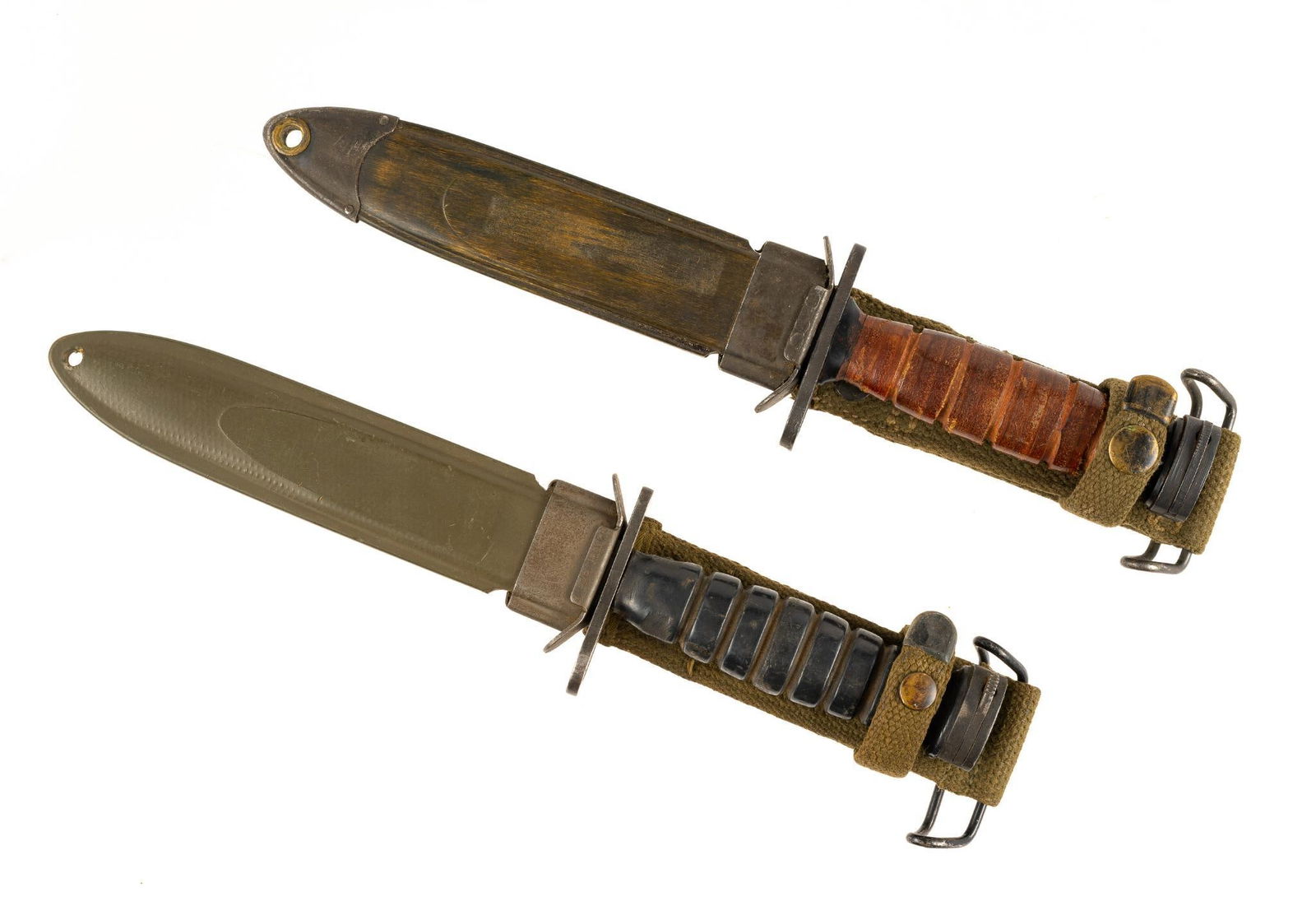 2 M1 Carbine Bayonet: One blade marked Kiffe. One hilt marked US M4. Overall 11-3/8" to 11-1/2" long. Blade measures 6-3/8" to 6-1/2" long.