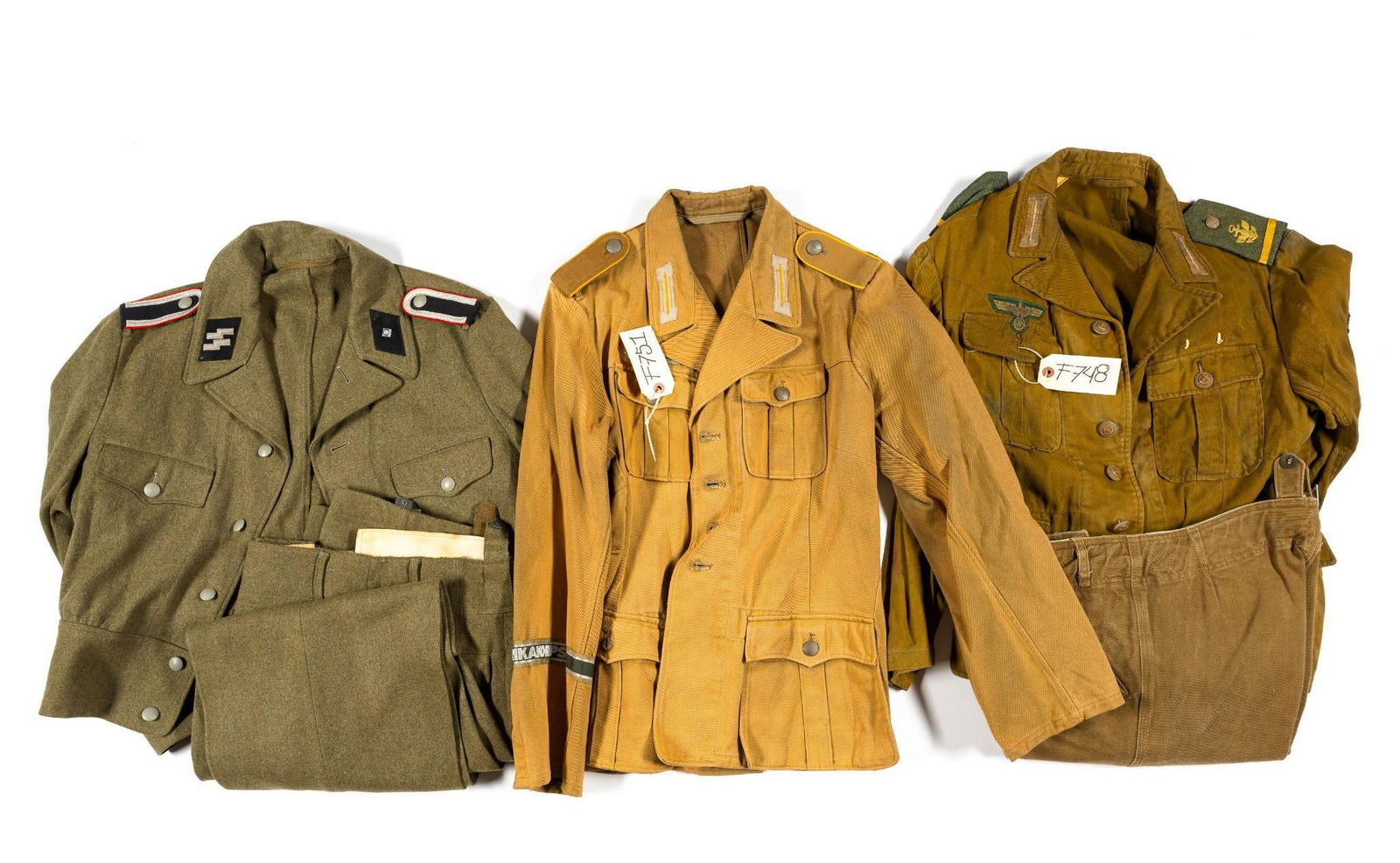 3 German Uniforms: Decals are questionable. Not certain if they are authentic or post-war.