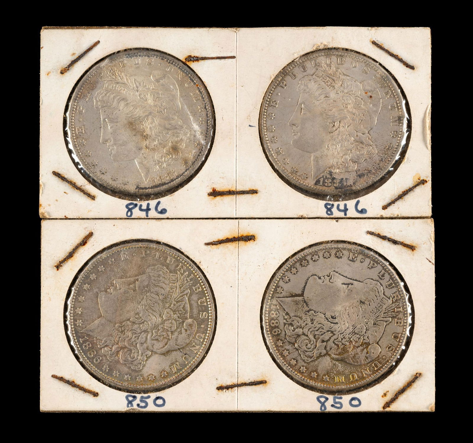 Four Uncirculated Morgan Silver Dollars (1 of 2)