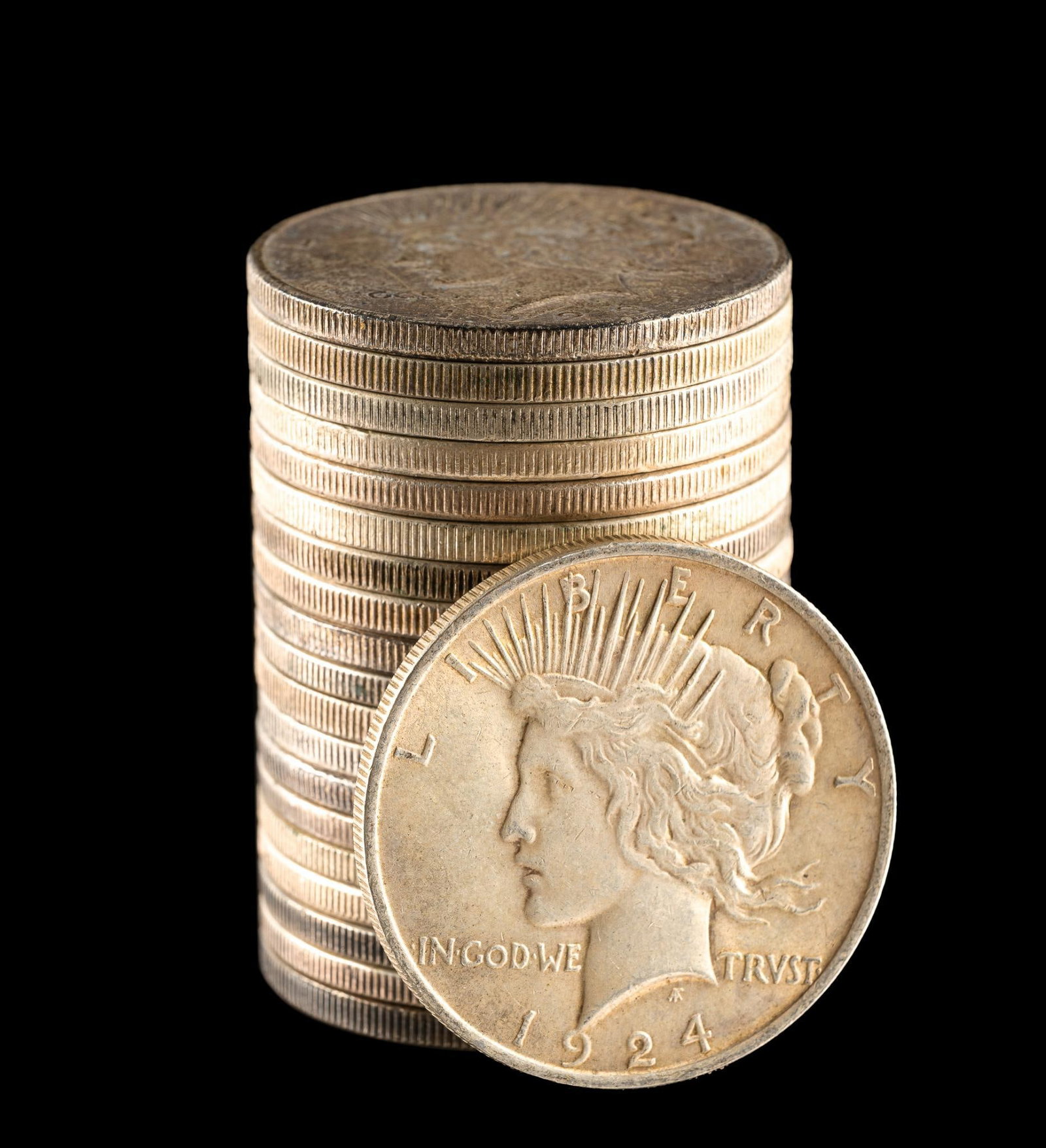 Twenty Morgan and Peace Silver Dollars: A mixture of common date silver dollars with decent grades.