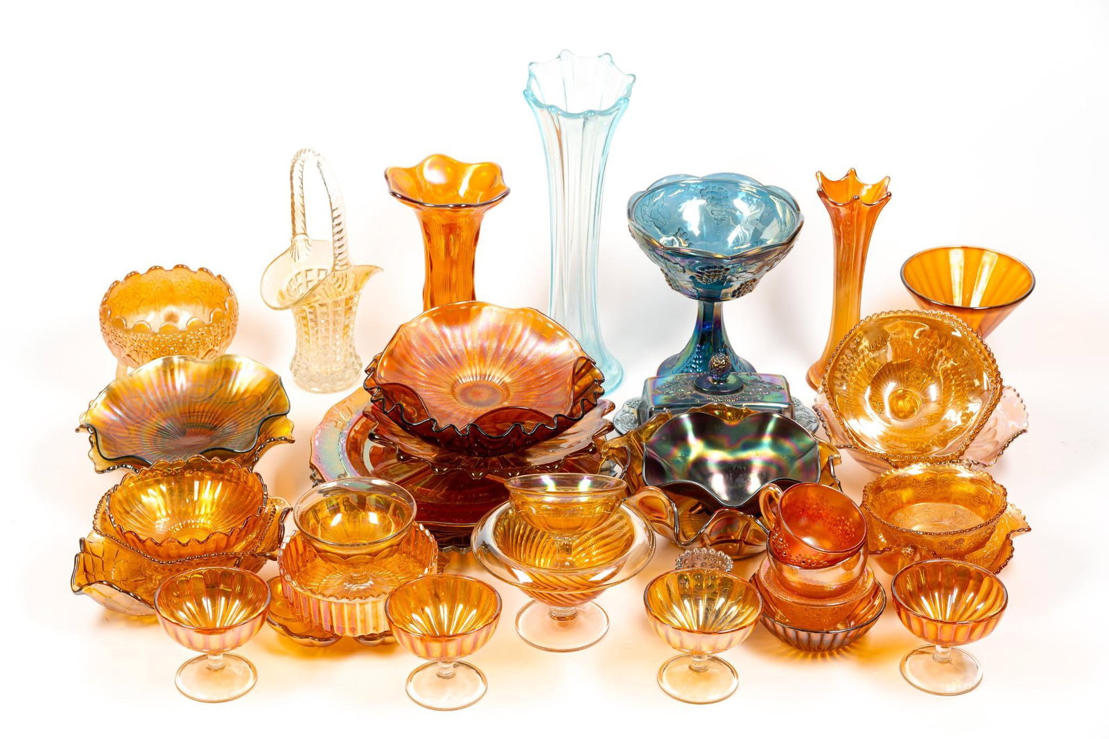 43 Pcs Carnival and Depression Glass: Overall good condition, with normal wear and tear associated with age. From 1-1/2" to 13-1/2" tall and 2-1/2" to 11" wide.