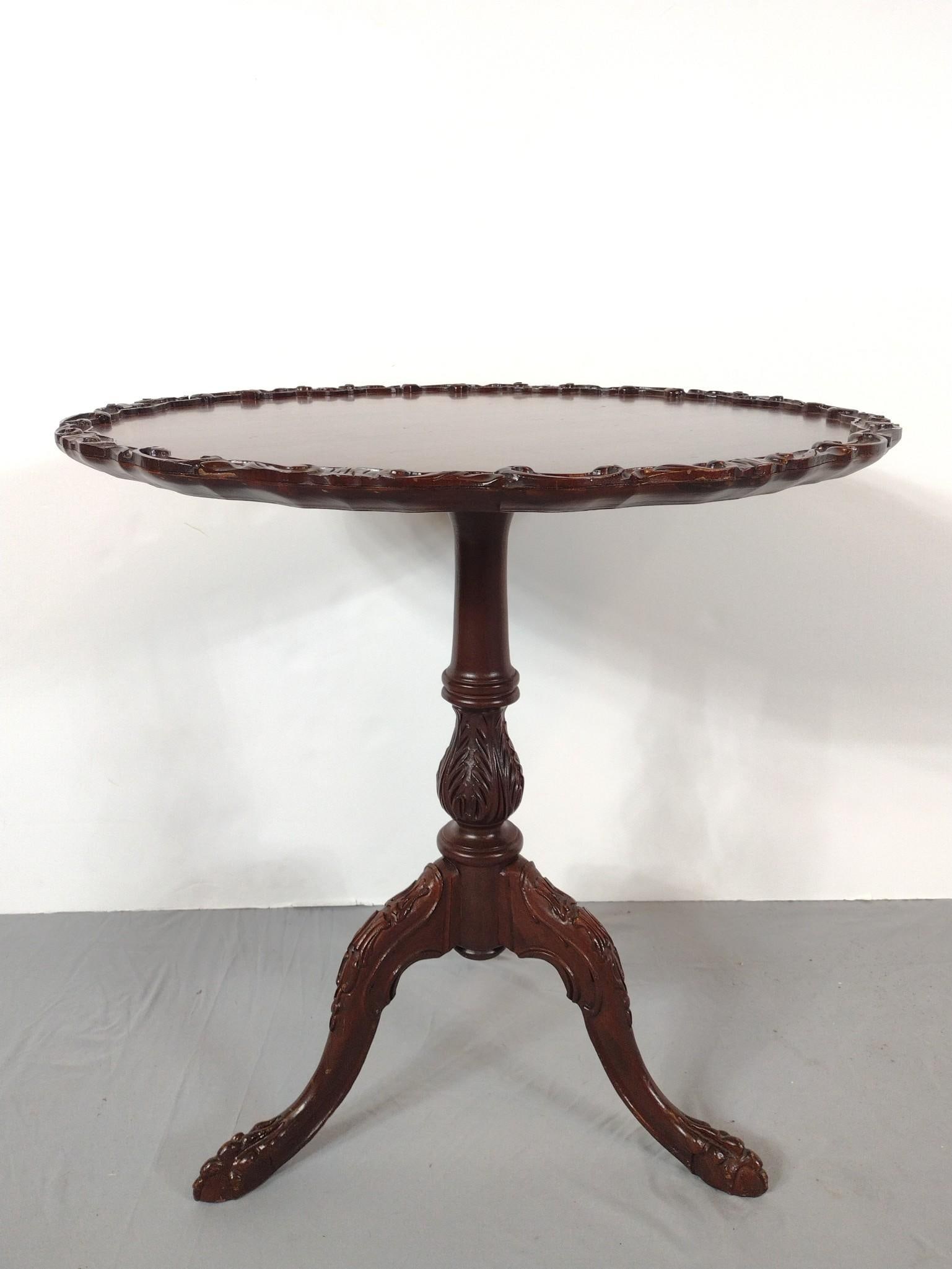 Chippendale Style Mahogany Tilt Top Table: NOT ELIGIBLE FOR IN-HOUSE SHIPPING: See Terms for Shipping Options. 29" diameter X 29-1/2" high. Has a few light scratches.
