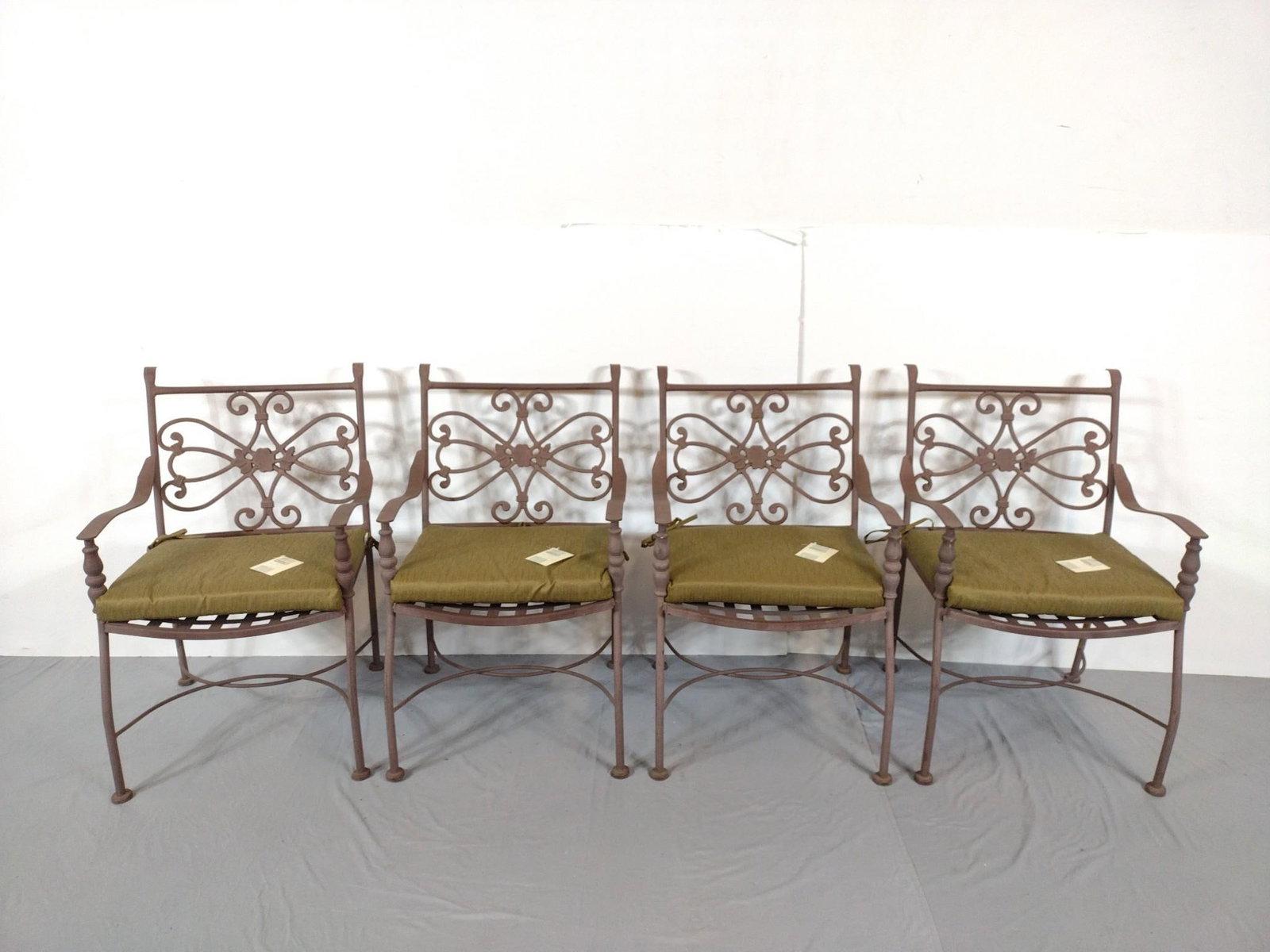 Set Of 4 Metal Outdoor Chairs: NOT ELIGIBLE FOR IN-HOUSE SHIPPING: See Terms for Shipping Options. Each 22-1/2" wide X 22" deep X 34" high. All have some light scratches. Comes with brand new At Home Cushions.