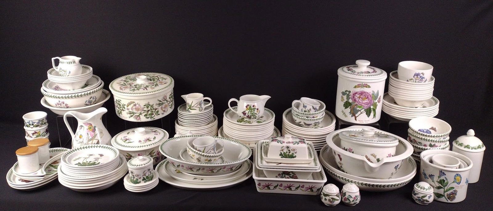 Approx. 135 Pcs Portmeirion "The Botanical Garden": NOT ELIGIBLE FOR IN-HOUSE SHIPPING: See Terms for Shipping Options. Includes 3 different variation of "The Botanical Garden." Serving platters, dinner plates, salad plates, appetizer plates, saucers,