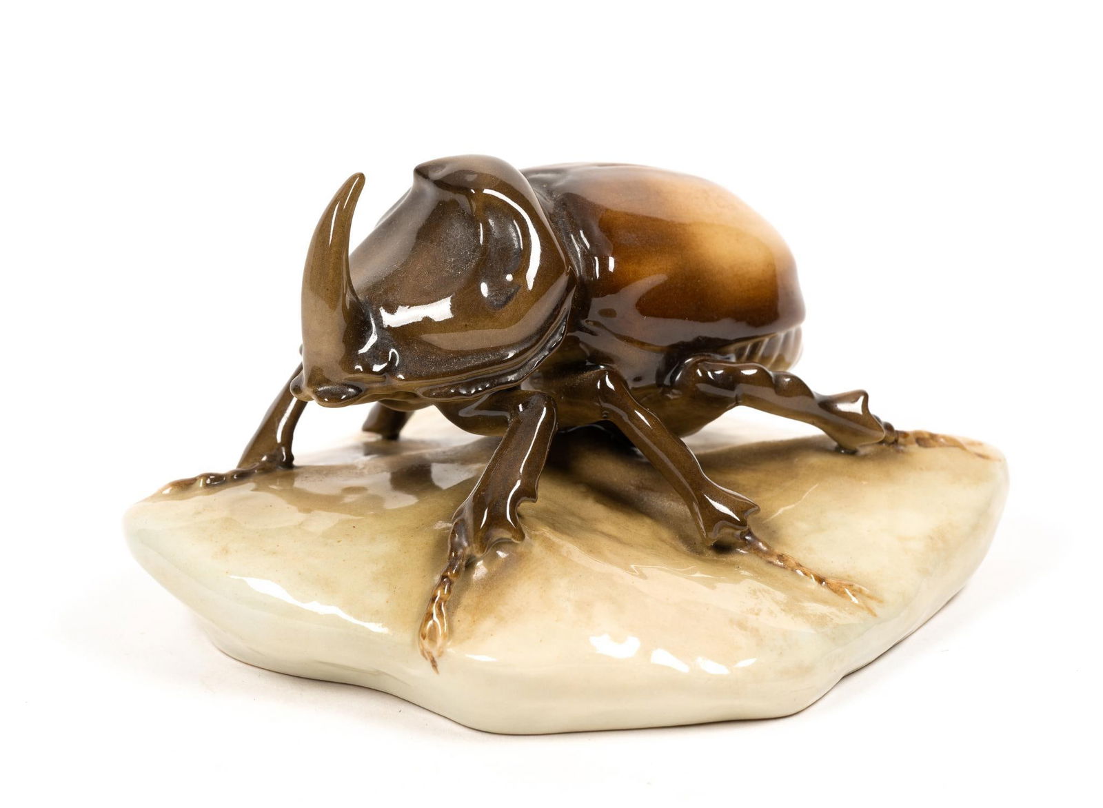 Royal Dux Porcelain Rhinoceros Beetle Figurine: Bottom marked. Sticker on back. 5" wide x 3-1/4" high.