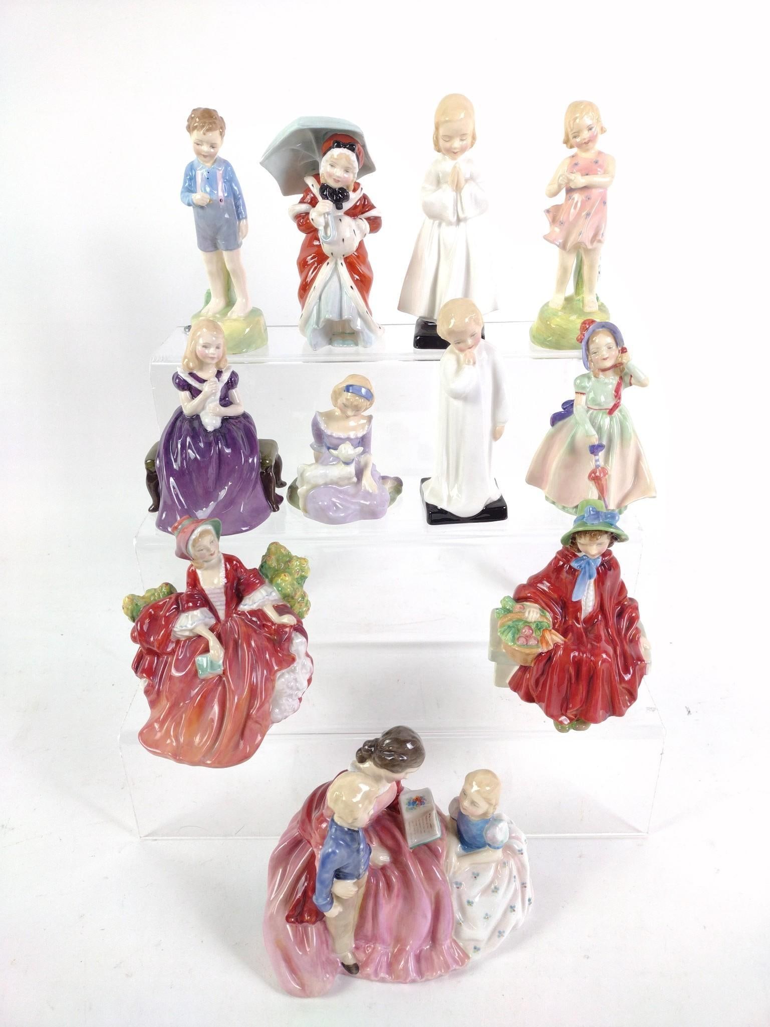 11 Royal Doulton Figurines: Includes Linda, Babie, Miss Muffet, Darling, BedTime, He Loves Me, She Loves Me Not, Mary had a little lamb, Bedtime Story, Lydia, and Affection. 3-1/4" to 6" wide x 4-3/4" to 5" high.