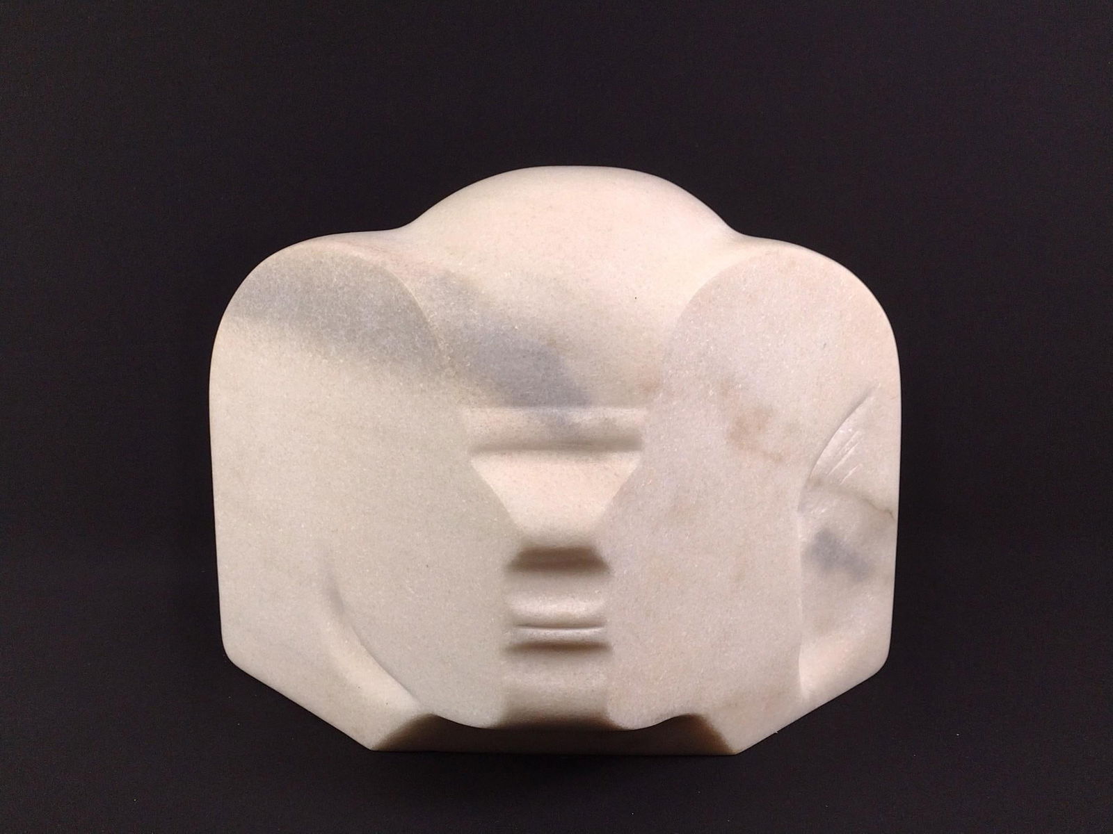 Marble Sculpture "Man-Woman" by James Cavagnaro: NOT ELIGIBLE FOR IN HOUSE SHIPPING: See Terms for Shipping Options. Ancient Greek abstract. Metal plate with artist's sign on back. 16-1/2" wide, 10" deep, 12-1/2" tall. ARTIST STATEMENT: James Emmanu