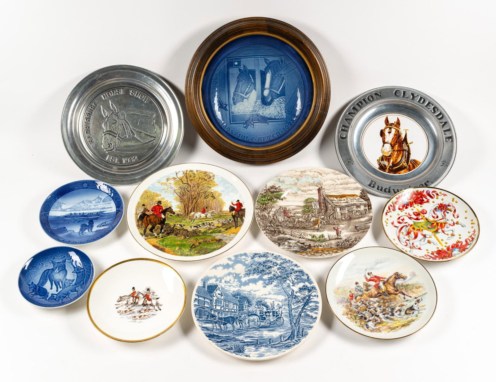 11 Fox and Horse Theme Collectible Plates: Includes Copenhagen and various other porcelain plates, as well as 2 metal plates. Includes 1 stand. Normal wear and tear associated with age. From 6" to 13-1/4" in diameter.