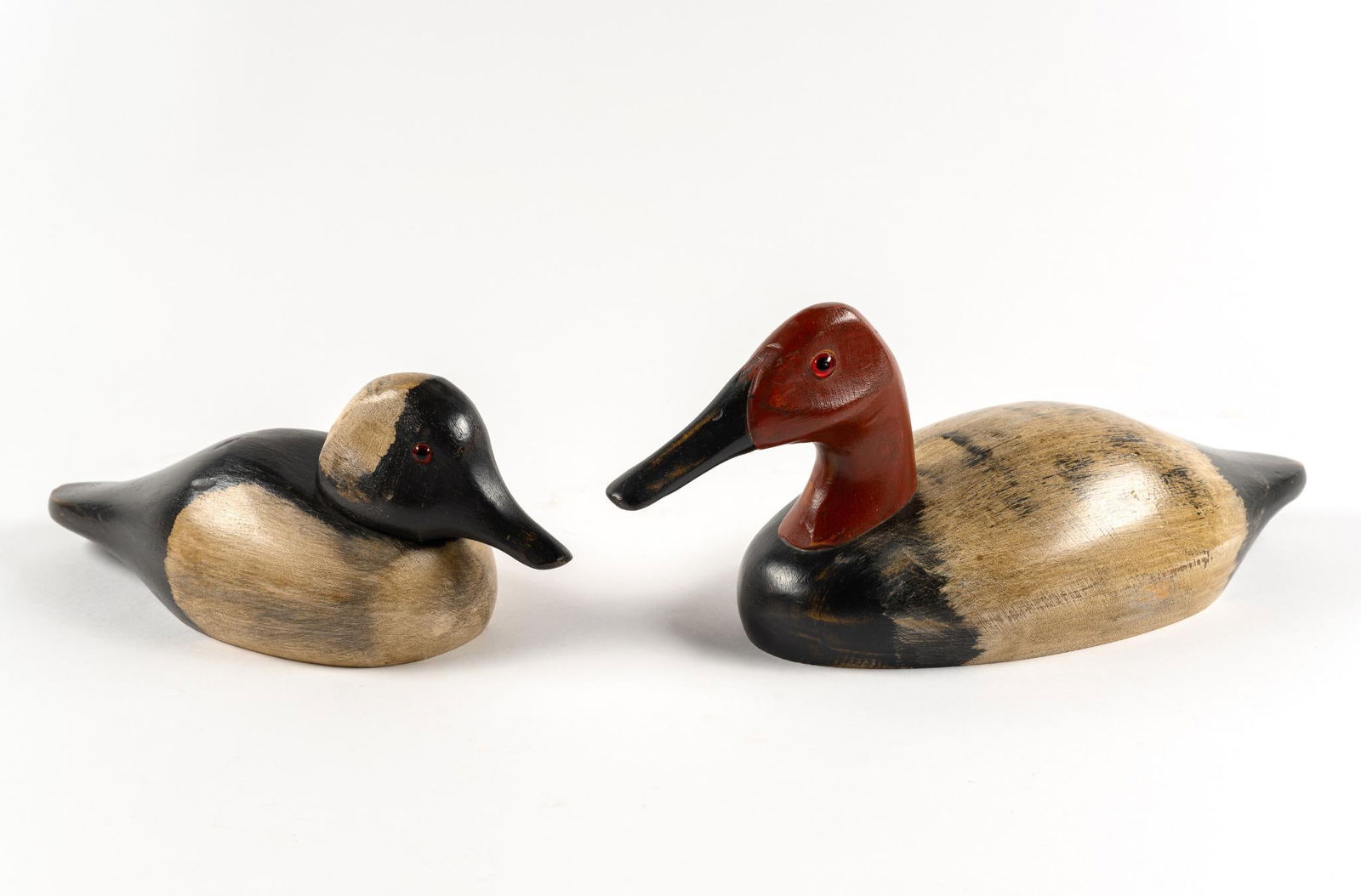 2 Duck Decoys: Both signed. 4-1/2" to 5-3/4" wide x 4-1/2" to 6" high.