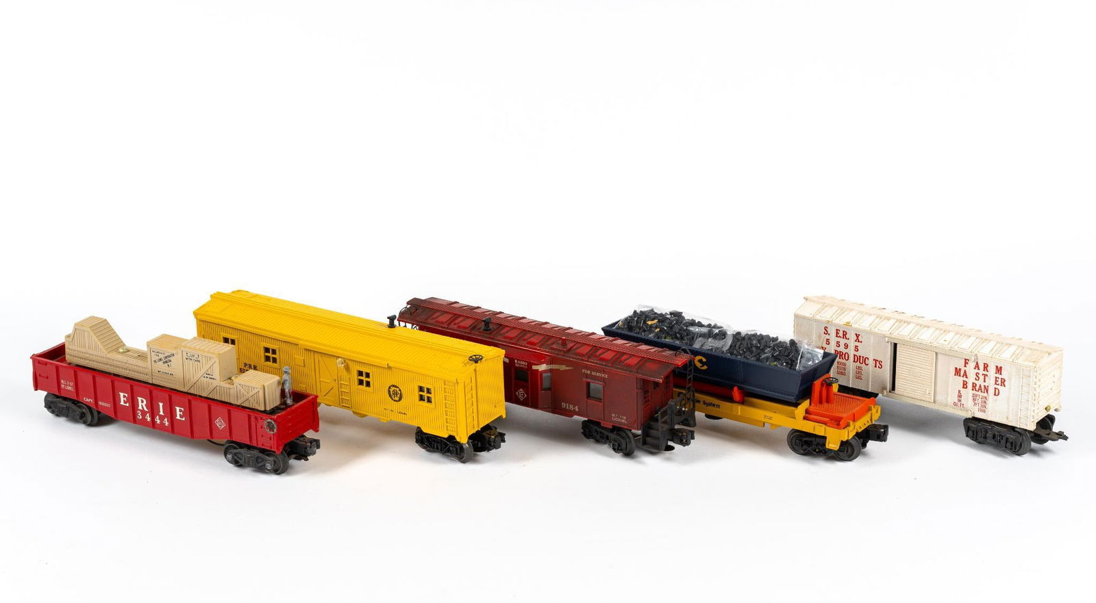 5 Model Train Cars incl. Lionel: Includes: Chessie System Operating Coal Dump Car, Lionel 3444 Erie Animated Operating Gondola, Lionel O-Gauge Erie Bay Window Caboose, Marx O-Gauge Dairy/Box Car, and Lionel 6-5724 O Gauge Pennsylvani