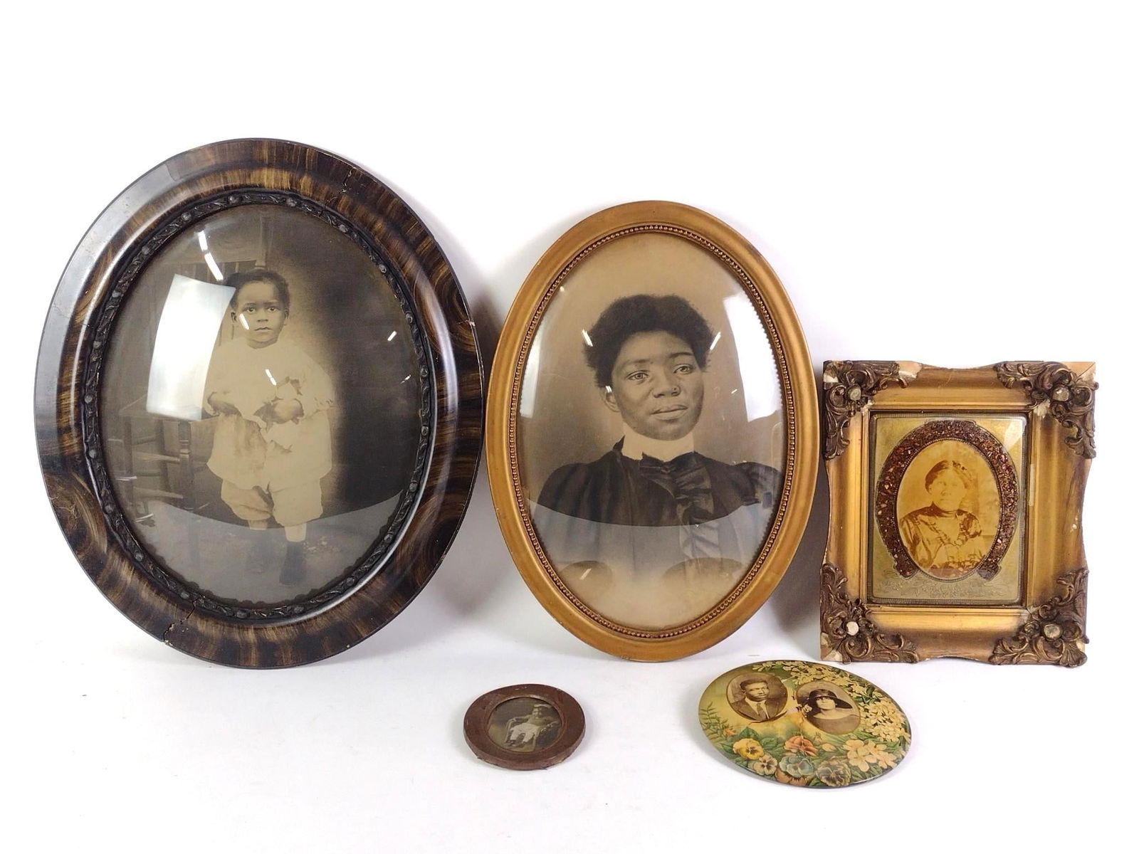 5 Framed Black Americana Photographs: NOT ELIGIBLE FOR IN-HOUSE SHIPPING - See Terms for Shipping Options. Depicts portraits of black individuals. Framed photographs. Frames are in poor condition. Photos show wear and tear associated with