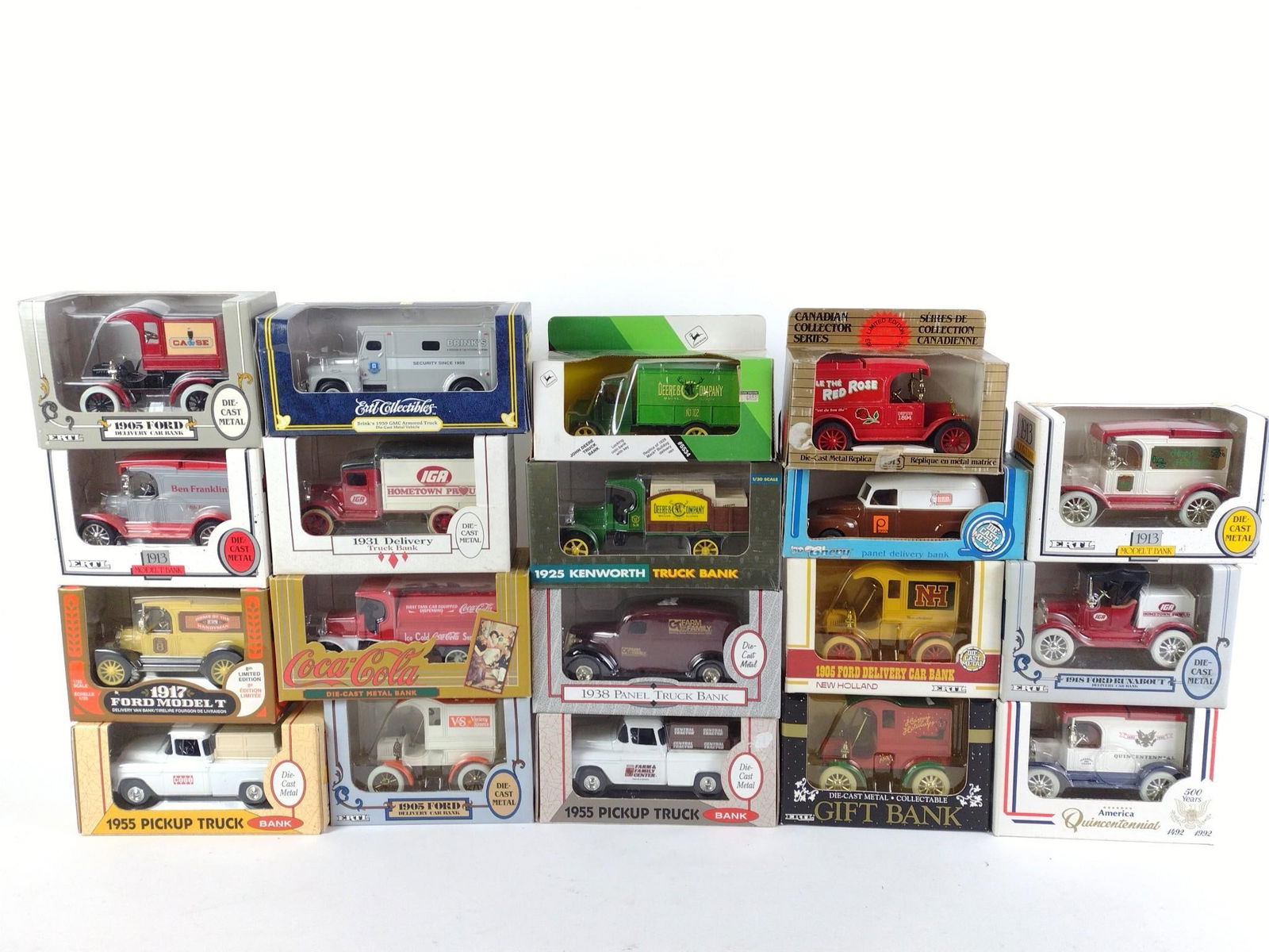 19 Ertl Die Cast Cars and Trucks: Includes John Deer, Chevrolet, and Ford. Normal wear and tear associated with age. From 7-1/4" to 9" wide and 4" to 5-1/4" tall.