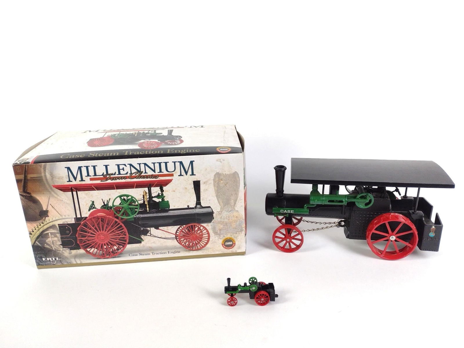 3 Case Steam Traction Engine Toys incl Millennium Farm Classics: Millennium Farm Classics is in original box. Signs of wear and tear associated with age. From 4" to 18" wide and 2" to 9-3/4" tall.