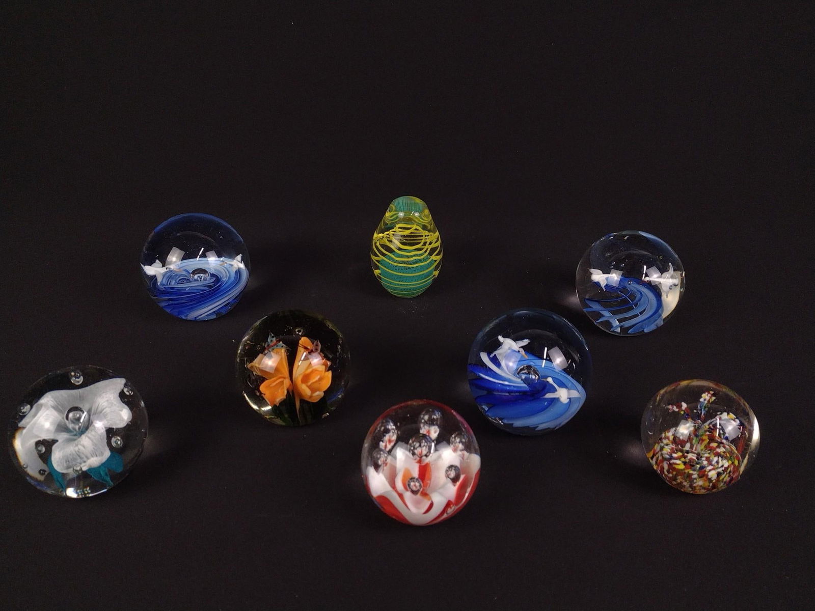 8 Glass Paperweights: From 2-1/2" to 3-1/2" tall.