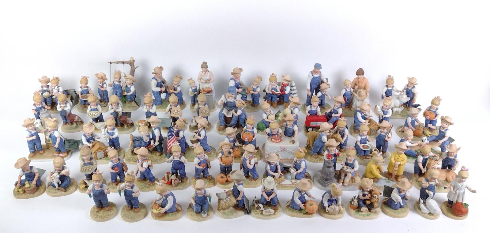 Large Grouping of "Denim Days" by Homco Figurines: Overall good condition. From 4" to 7-1/2" tall and 2-3/4" to 5-1/2" wide.