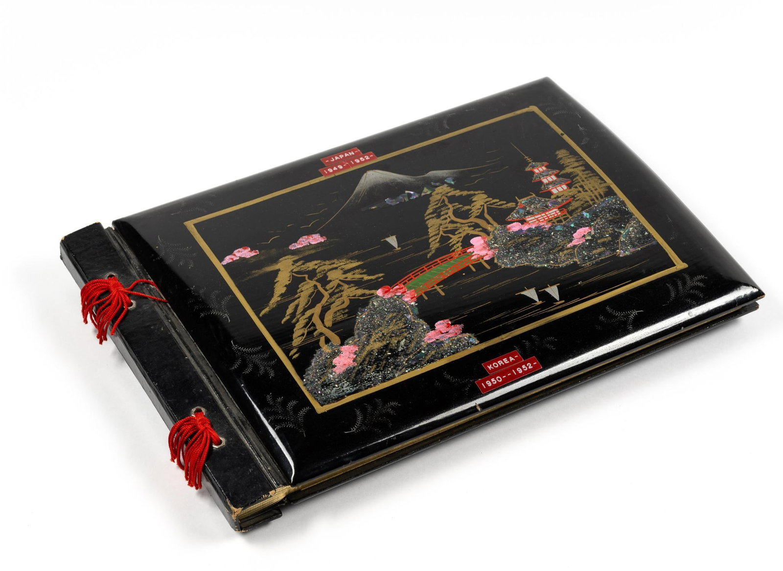 Soldier's Photo Album: Includes his service in Japan 1949-1952 and Korea 1950-1952. Pictures include tourist photos and soldier's photos. Inside cover with medals and patches. They include Fort Hood 2nd Armored Division; Ma