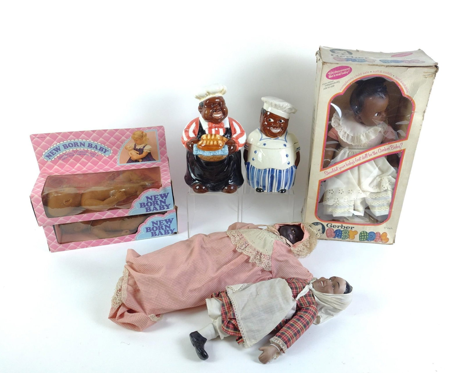 Black Americana incl Cookie Jars: 2 Chef cookie jars, one marked as made in Japan. Both in good condition with normal wear and tear associated with age, from 10-1/4" to 11" tall and 6" to 7" wide. Also includes 5 Black Americana dolls