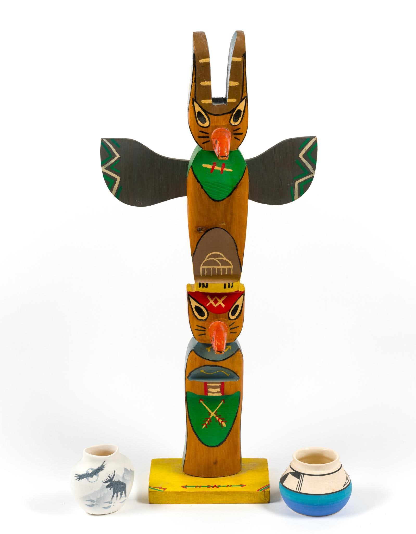 2 Native American Vases & Totem Pole: One pot marked Ute Mtn. Totem pole marked Jennifer L. Kohl. Pots measure 3-1/2" to 4" wide x 3" to 3-3/4" high. Totem pole measures 11" wide x 24-3/4" high. PROVENANCE: From the Estate of Virginia Par