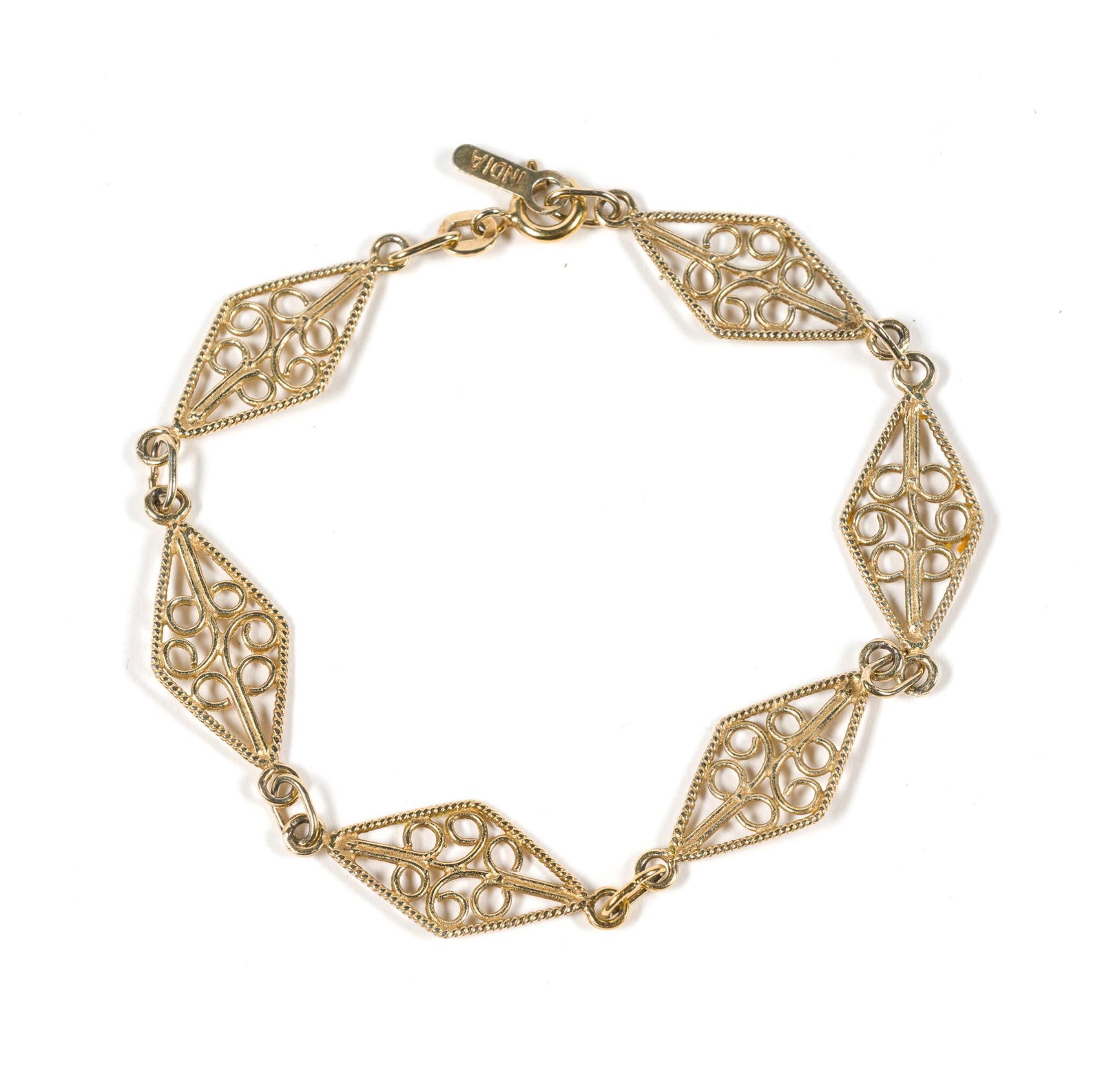 Sterling Silver Bracelet: 7" length. Marked India 925. 0.13 ozt.
