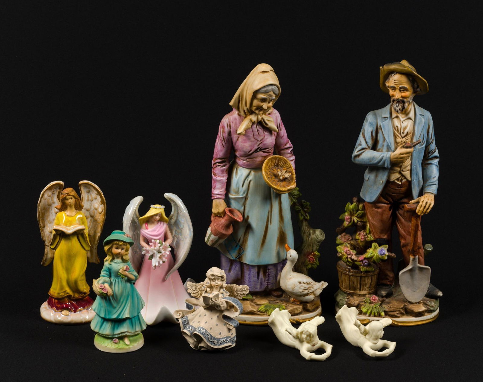 8 Porcelain Figurines: Includes angels. Overall good condition. From 1" to 13-1/2" tall and 2-1/2" to 5-1/2" wide.