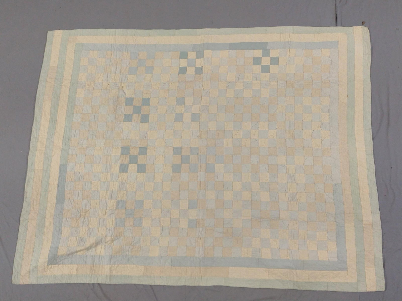 Antique Quilt: Some staining. 55" long x 43" wide. PROVENANCE: From the Estate of Virginia Parkum. The Rev. Dr. Virginia "Ginny" Cohn Parkum (1943-2025) was a Harrisburg resident dedicated to her art and serving her