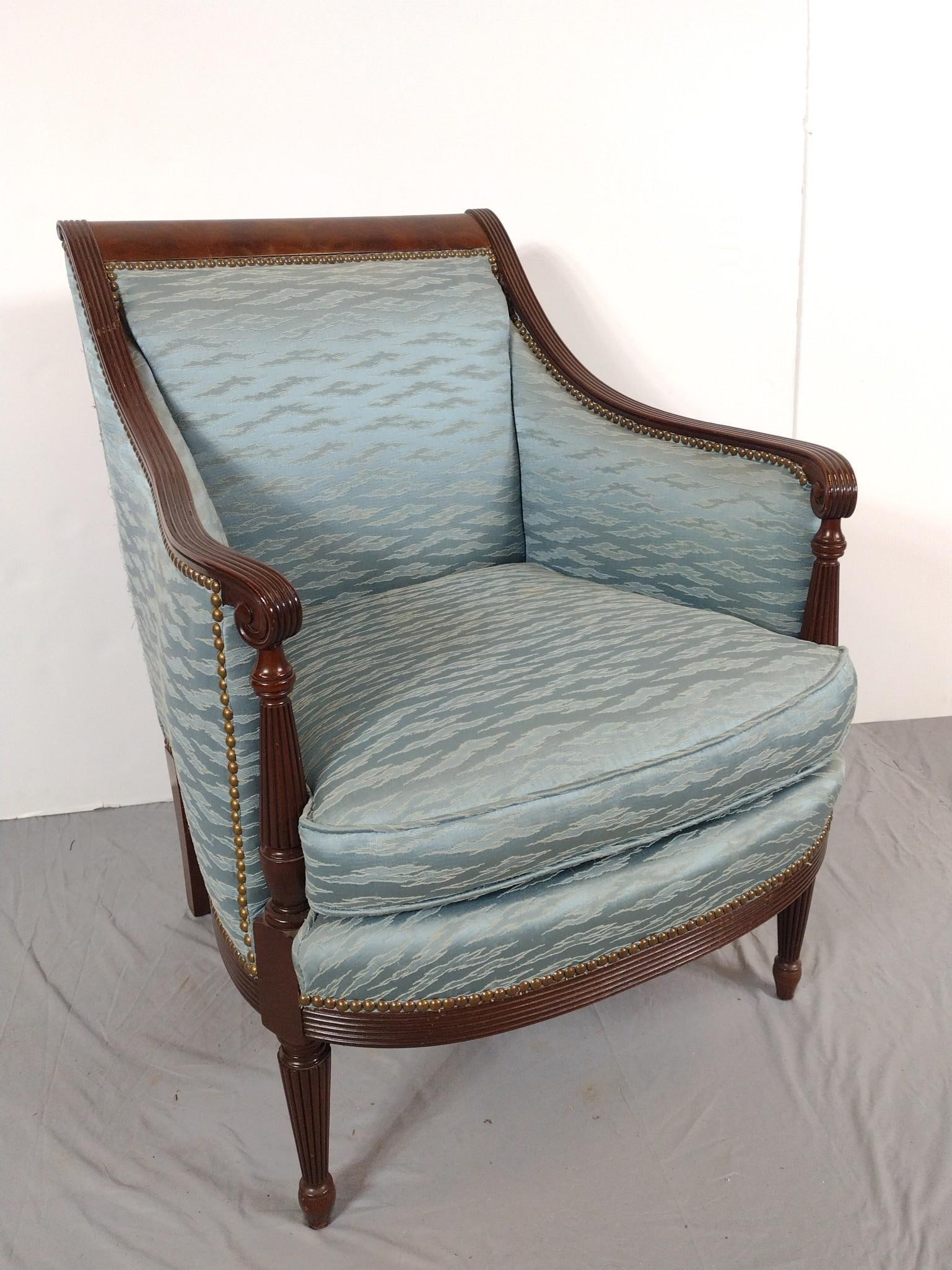 Colonial Revival Arm Chair: NOT ELIGIBLE FOR IN-HOUSE SHIPPING: See Terms for Shipping Options. Circa 1920-40, satinwood barrel shaped chair covered in old upholstery simulating satin. 26" wide X 25" deep X 34" high. Has some li