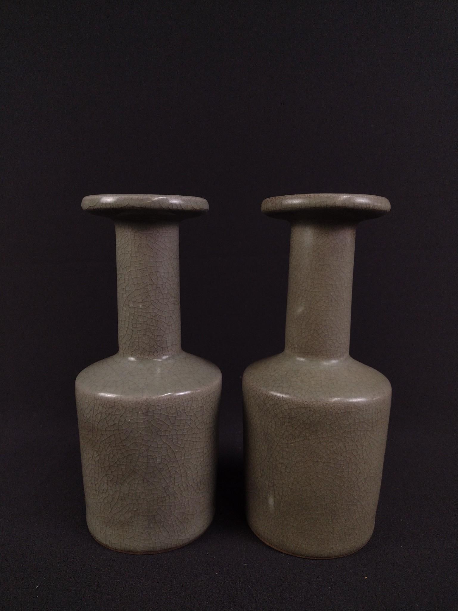 Pair Of Chinese Guan Ware Vases: Unsigned. Both 9" tall and 4" wide.
