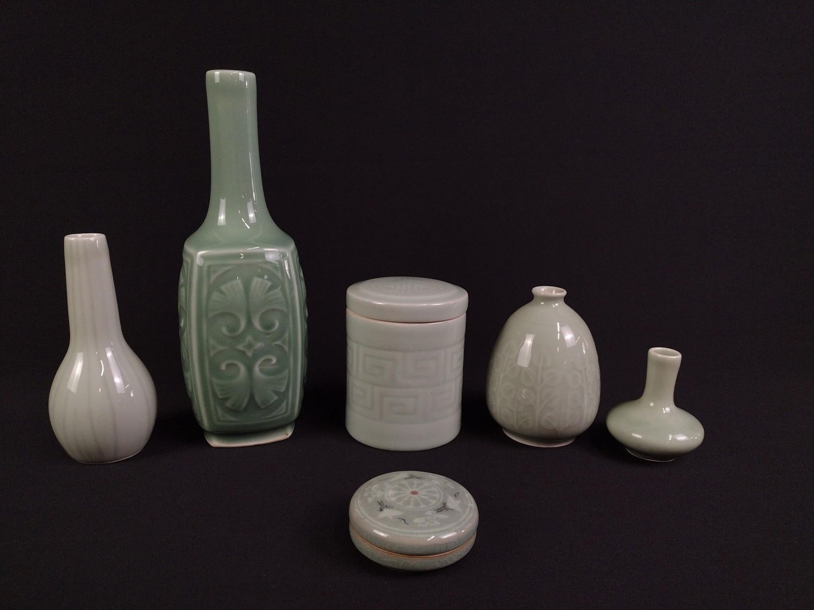 6 Celadon Ceramic Pieces: 2-1/2" to 3" wide x 2-1/2" to 9-1/2" high.