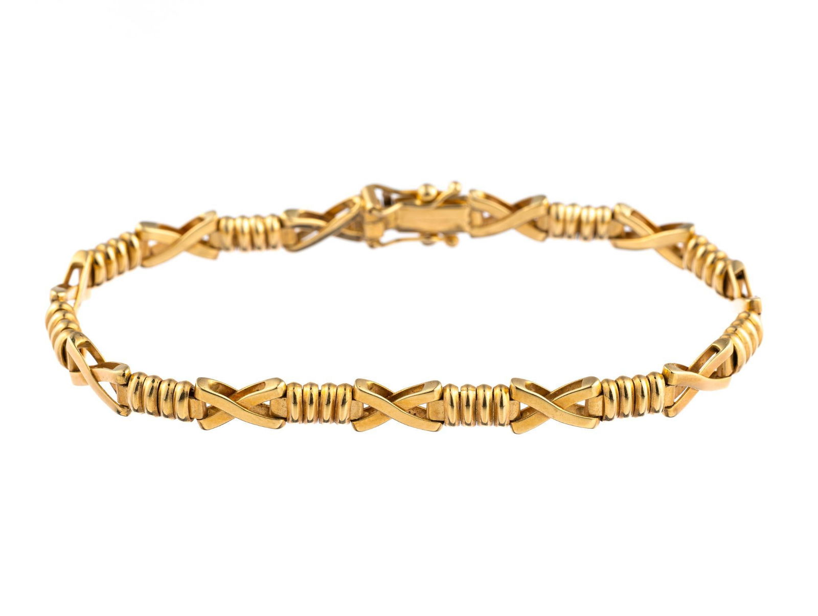 Aurafin 14K Gold Bracelet: A 7" length bracelet with hinged designer links. The weight is 11.7 grams.
