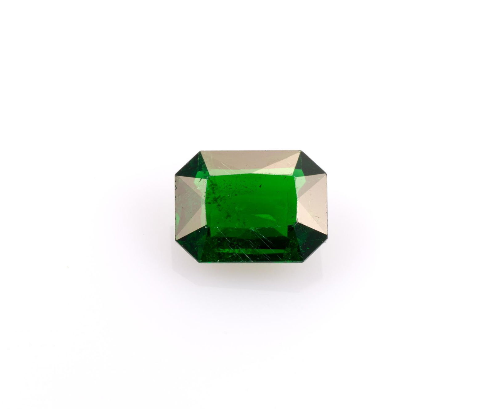 Unmounted Tsavorite: Fancy, 2.00 carats. From a selection of fine gemstones of a retiring GIA Graduate Gemologist, custom jewelry designer, appraiser, artist, and avid collector.