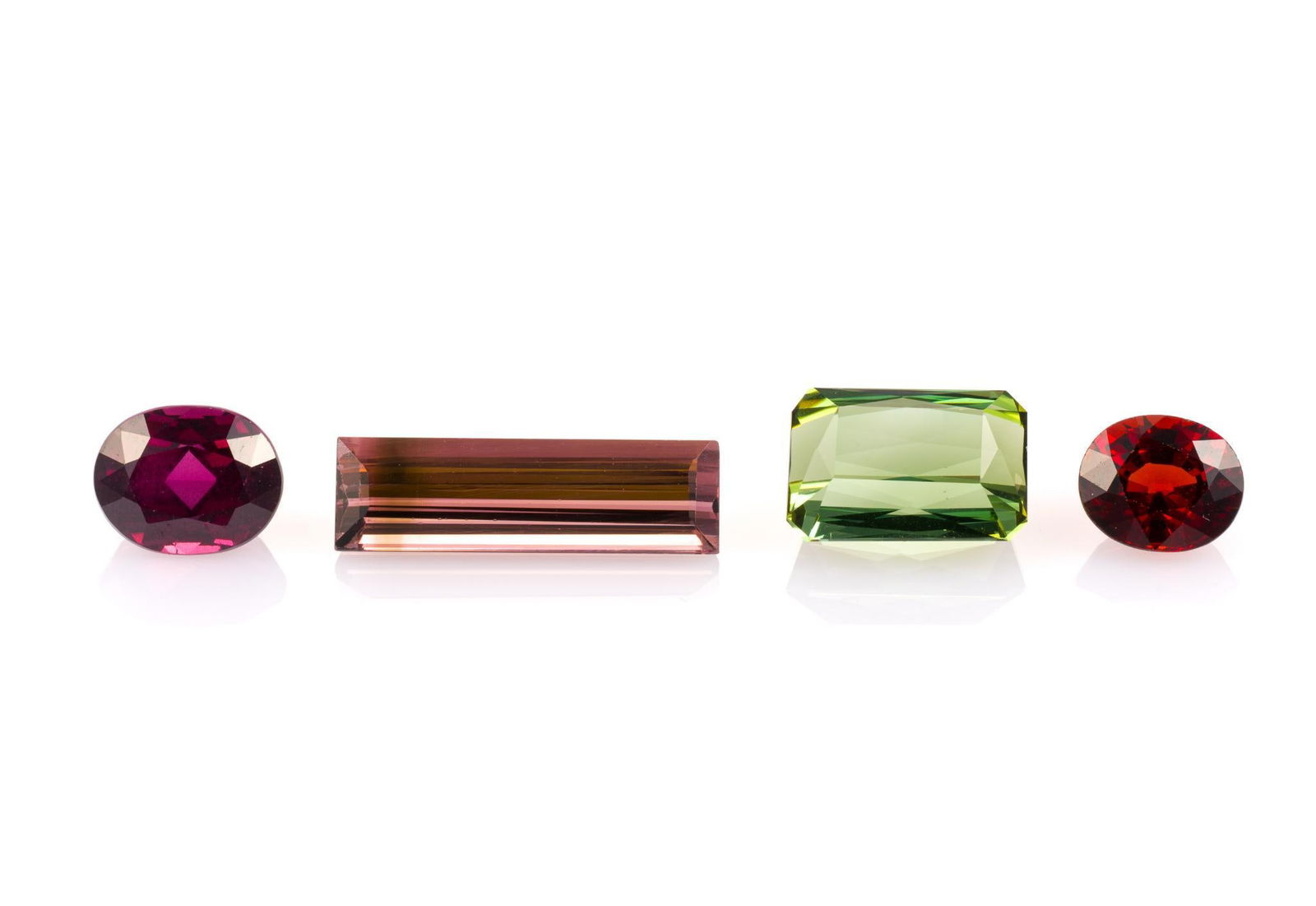 4 Unmounted Gemstones: Includes (1) Tourmaline, octagon, 6.36 carats, VVS, unheated; (2) Spessartite Garnet, oval, 2.81 carats, VS, unheated; (3) Almandite Garnet, oval, 4.18 carats, VS, unheated; and (4) Tourmaline, emeral