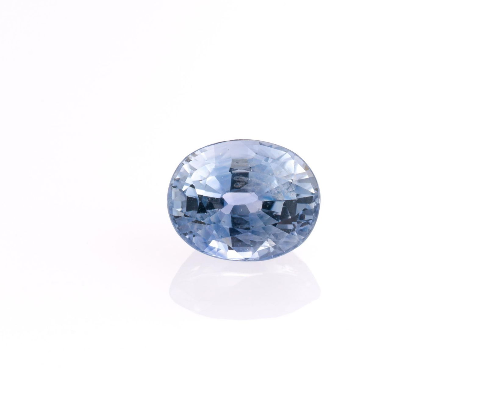 Unmounted Sapphire: Oval. 1.76 carats, SI1, no treatment. From a selection of fine gemstones of a retiring GIA Graduate Gemologist, custom jewelry designer, appraiser, artist, and avid collector.
