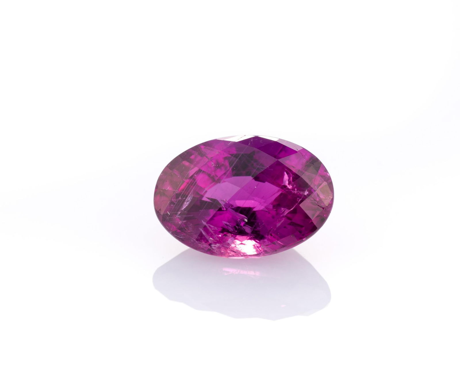 Unmounted Purple Sapphire: Mixed oval cut, 2.40 carats, unheated. From a selection of fine gemstones of a retiring GIA Graduate Gemologist, custom jewelry designer, appraiser, artist, and avid collector.