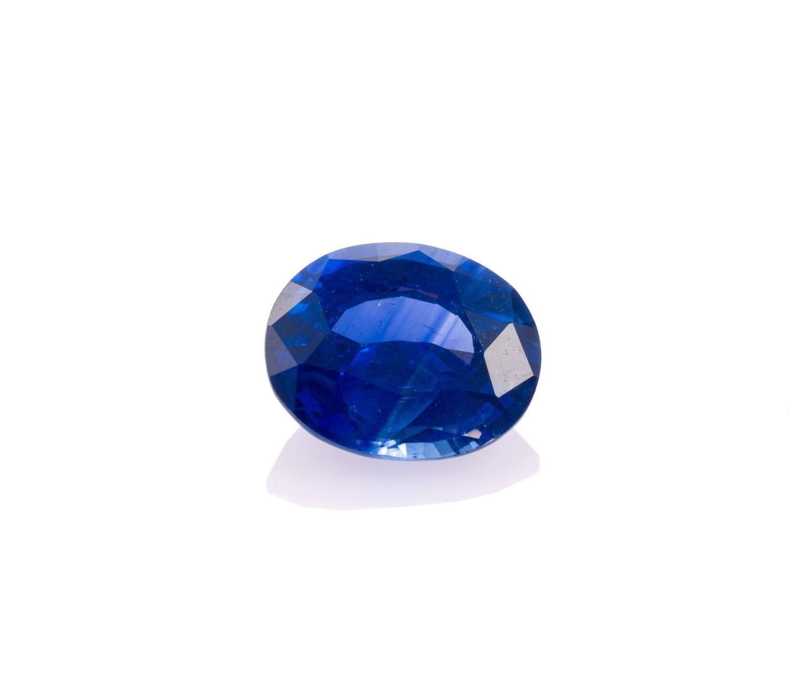 Unmounted Sapphire: Oval cut, 1.85 ct, appears heat treated. From a selection of fine gemstones of a retiring GIA Graduate Gemologist, custom jewelry designer, appraiser, artist, and avid collector.
