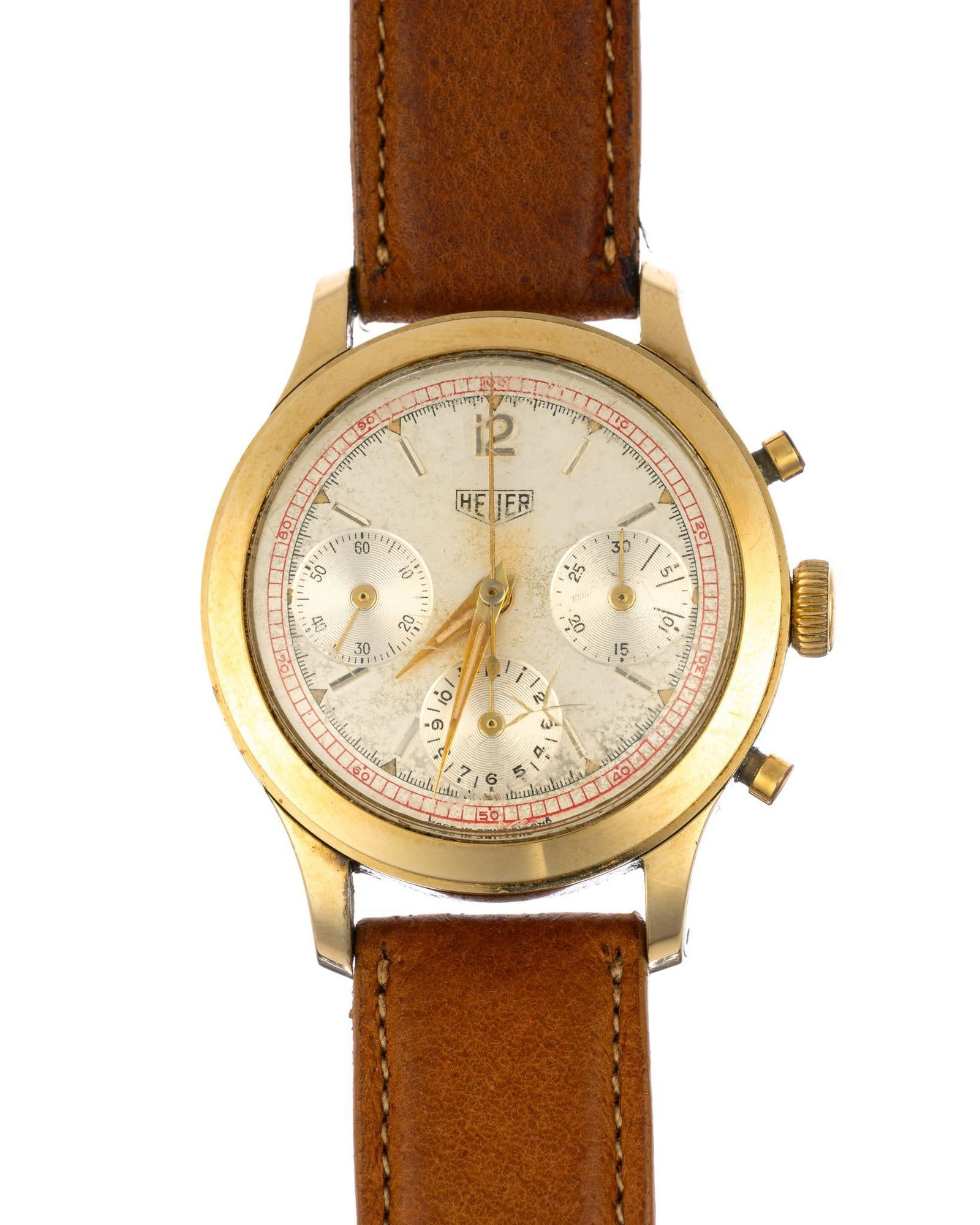 Antique Heuer Chronograph: A 1961 Heuer small-pusher chronograph in stainless steel with 14k gold top. This watch comes with the original box and papers. It has a fully original dial with light patina spotting and some radium b