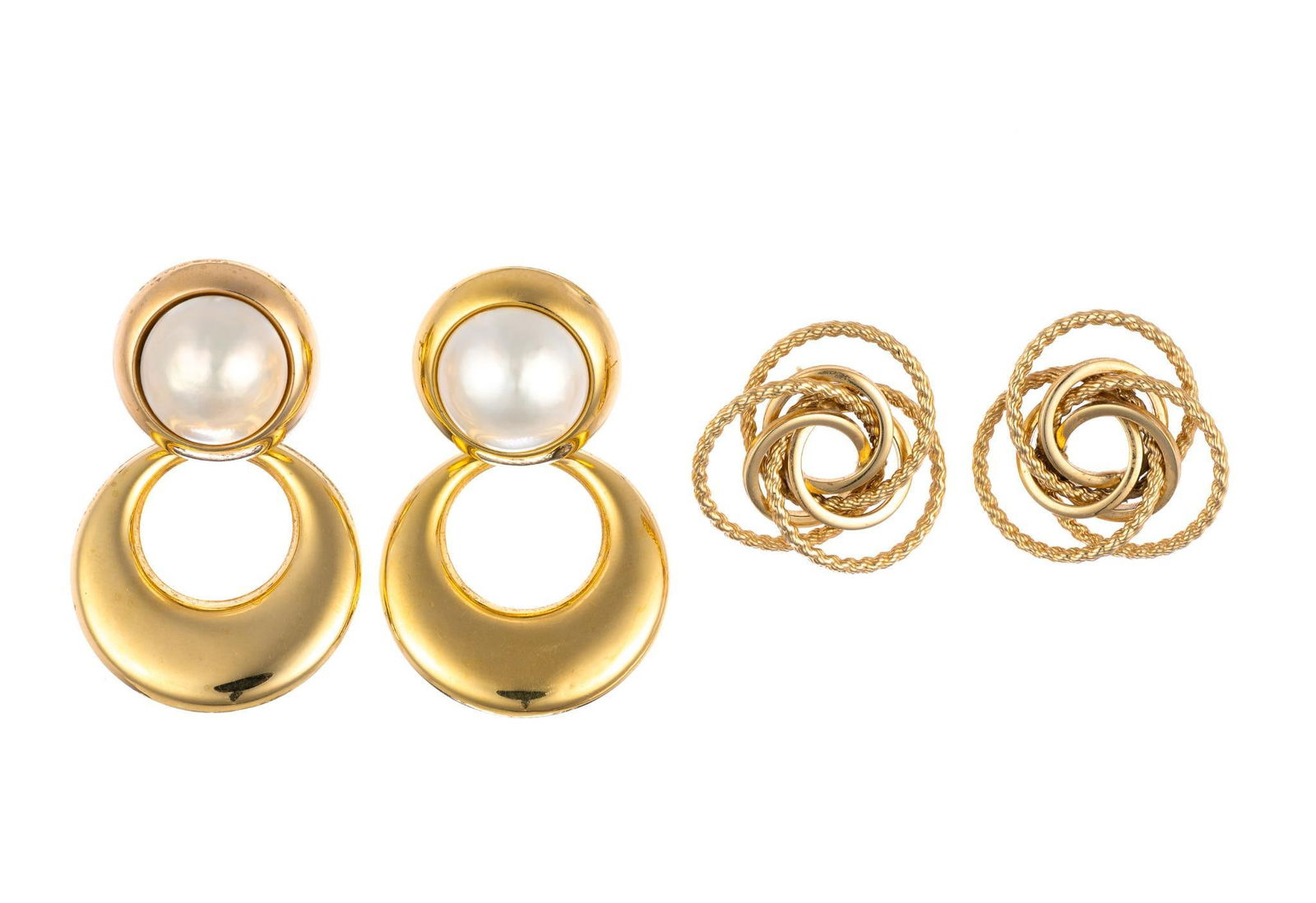 Two Pairs 14K Gold earrings: One pair with mabe pearls and gold drops with 14k backs included and one pair with intertwined rings has no backs. The larger drop earrings are 1 7/8" length. One dent noted on the frame of one of the