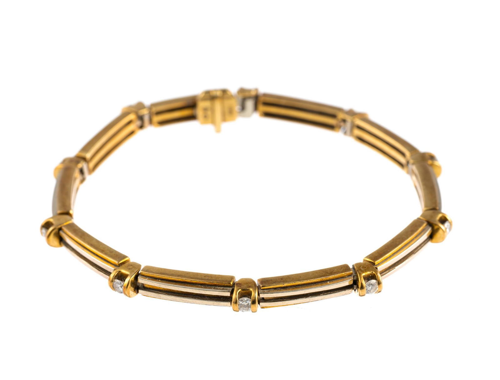 14K Gold And Diamond Bracelet: A 6 3/4" flexible link bracelet in white and yellow gold. It has small diamonds at each link. The weight is 21.7 grams