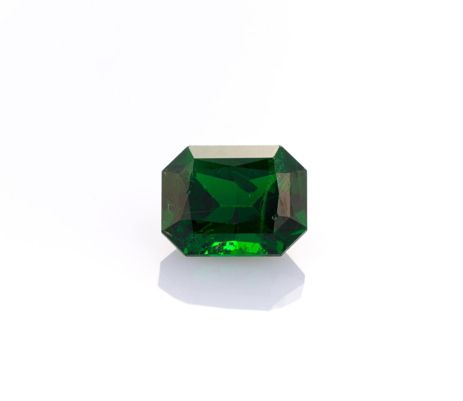GIT Graded Tsavorite: Rectangular bevelled, 2.08 carats, natural. From a selection of fine gemstones of a retiring GIA Graduate Gemologist, custom jewelry designer, appraiser, artist, and avid collector.