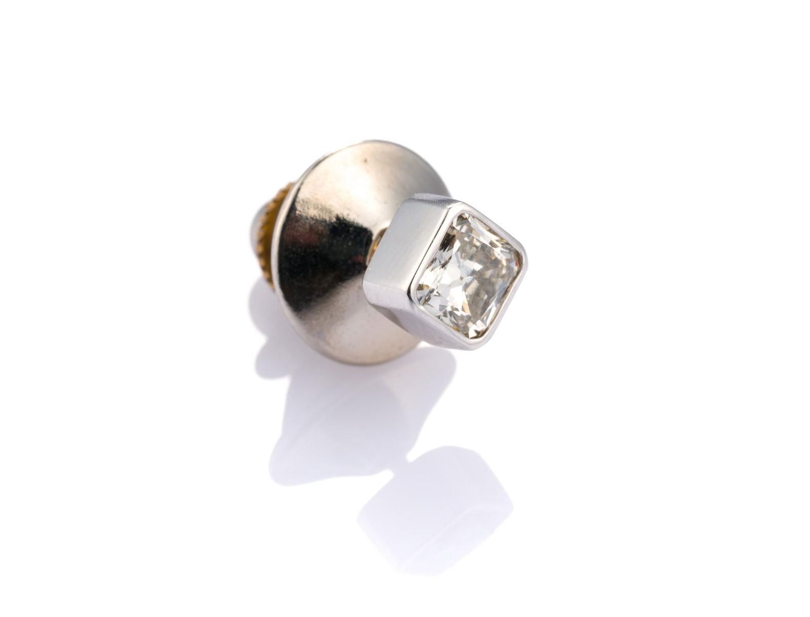 14K Gold And Diamond Pin: A 3/4 carat princess cut diamond approximately L-M color and with VS clarity in a white gold pin. The weight is 1.1 grams not including the non-gold back.