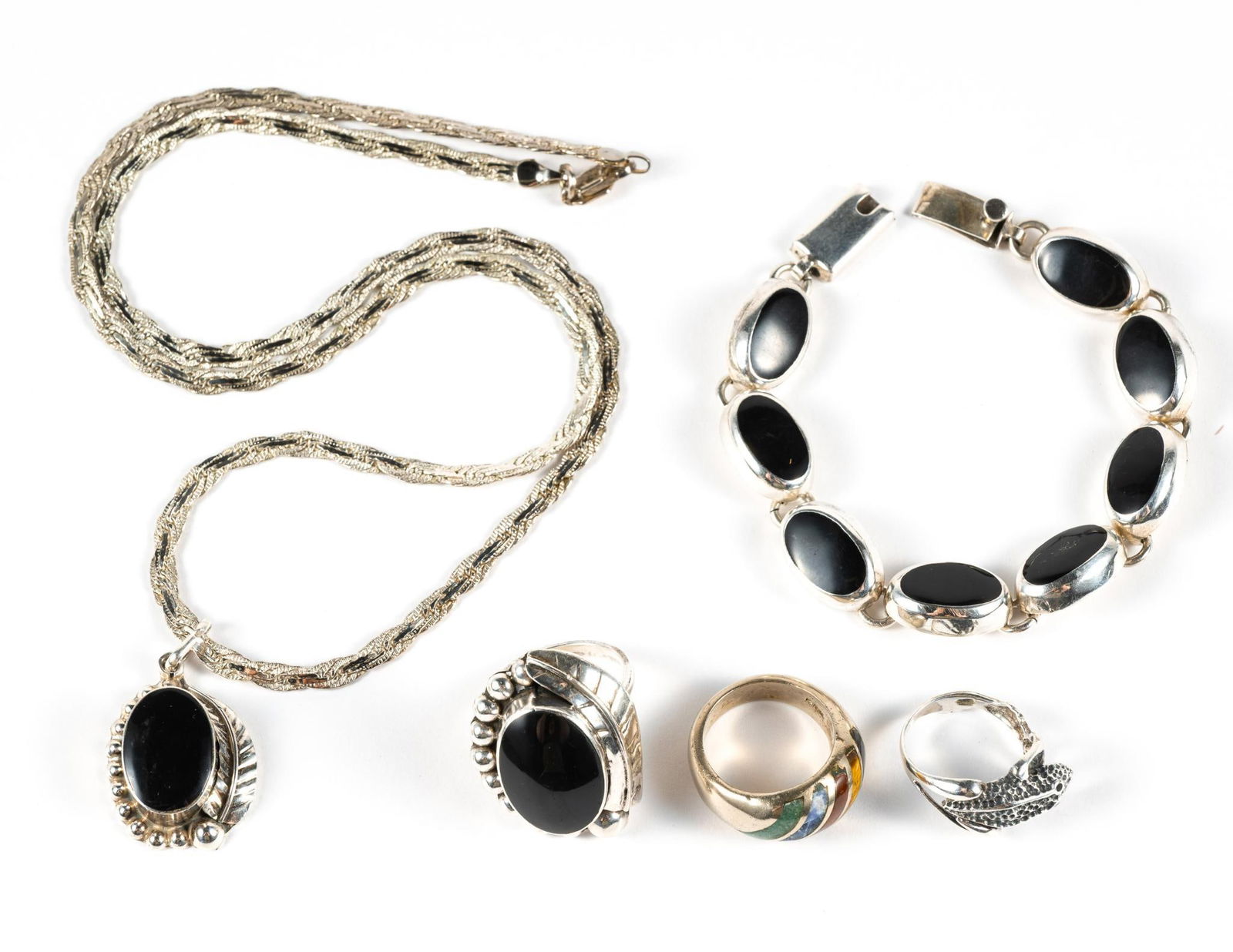 Sterling Silver Rings Pendant Necklace Bracelet: A nice assortment of sterling jewelry includes an adorable tree frog ring in size 7.5, a Taxco Mexico onyx ring size 9.5 with a matching pendant and a 23.5" chain for the pendant. Also a 7 1/2" length