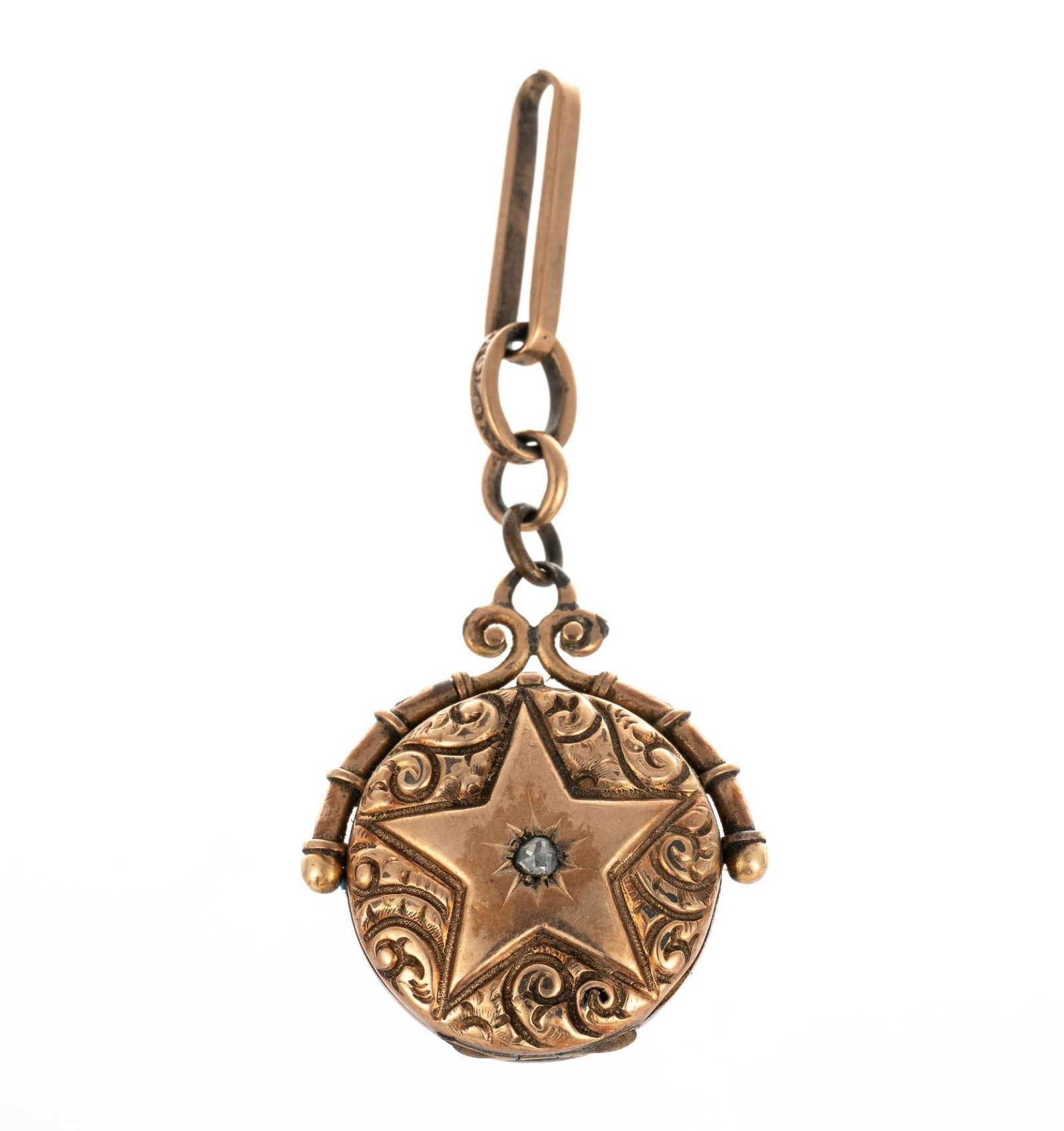 Antique Rose Gold Locket: Tests 9k - 10k gold. Small diamond set to center. 8.1 grams including interior glass cover.
