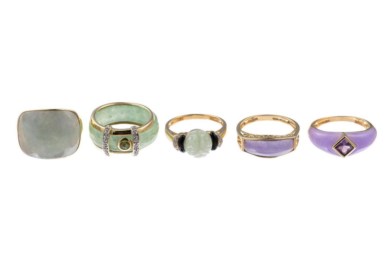 Five 14K Gold and Jade Rings: Most of the rings are marked for China or Hong Kong and are sized 8.5 to 9, 14k yellow gold. Green and lavendar jade, onyx, peridot, diamonds, and amethyst gemstones. Total weight is 26.4 grams.