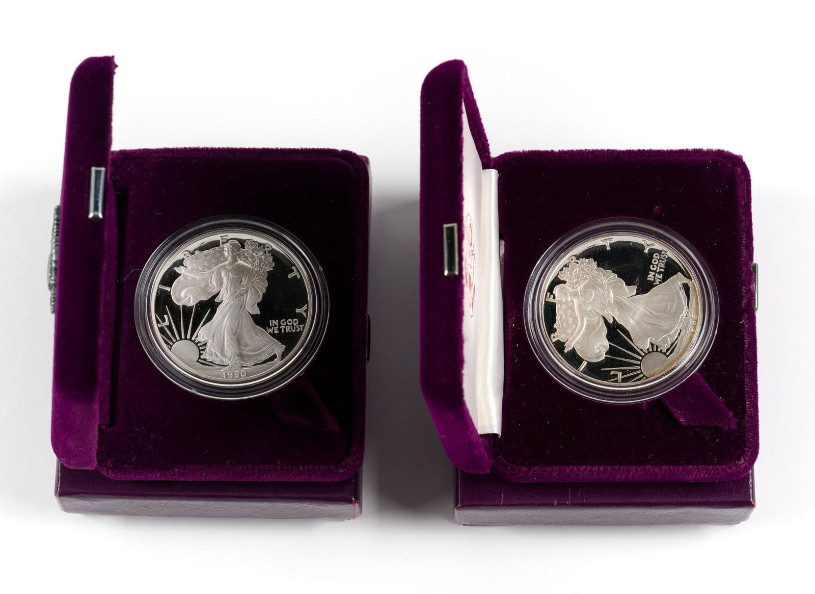 Two Proof American Eagle Silver Dollars: Both coins are in the original double boxes. Dates are 1986-S and 1990-S