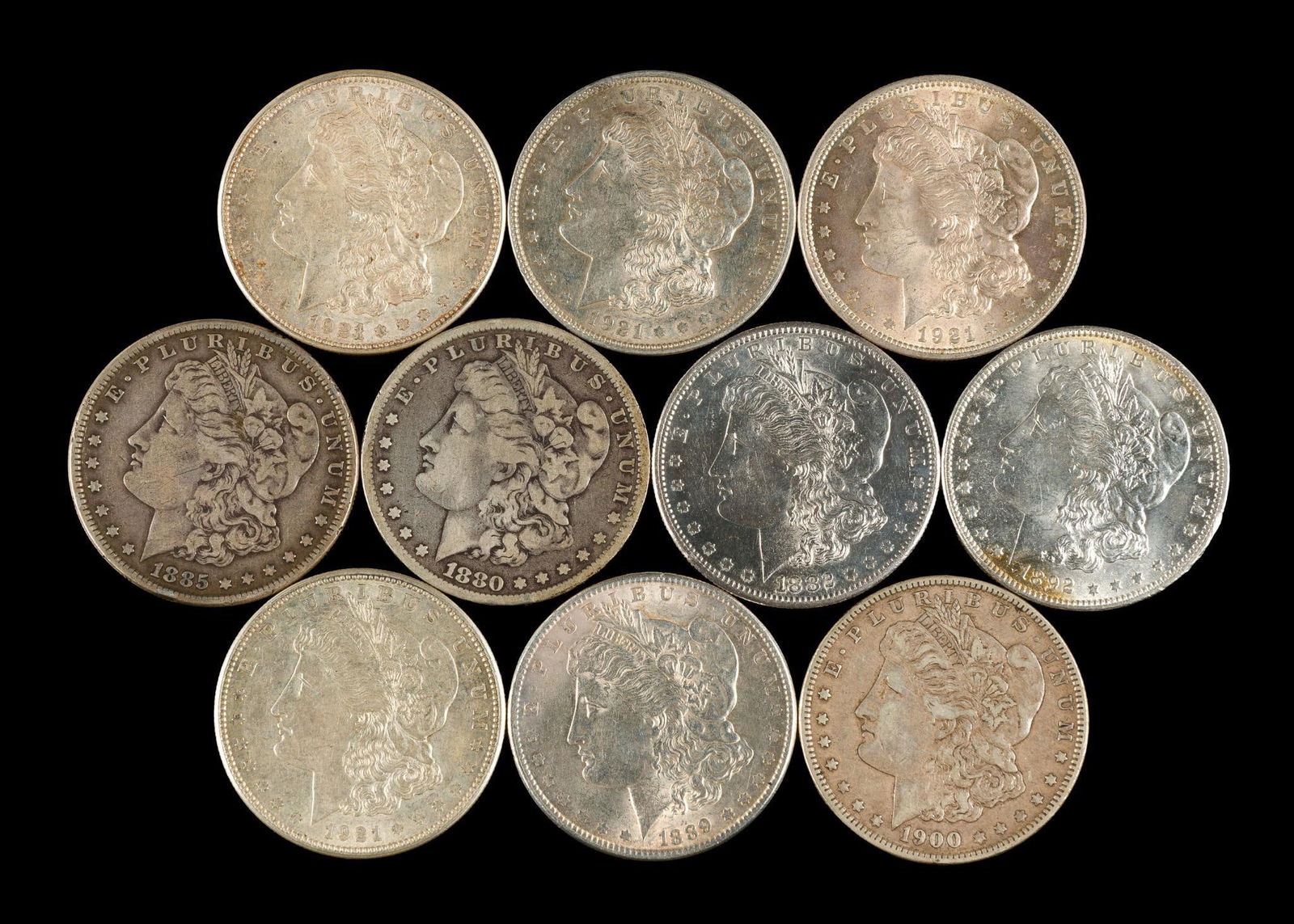 Ten Morgan Silver Dollars.: The group contains a few better grade coins.