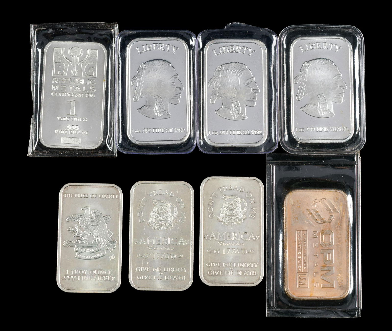 Eight Silver One Ounce Bars: Liberty, Republic Metals, Indian Head, OPM Metals. Each pure silver one ounce.