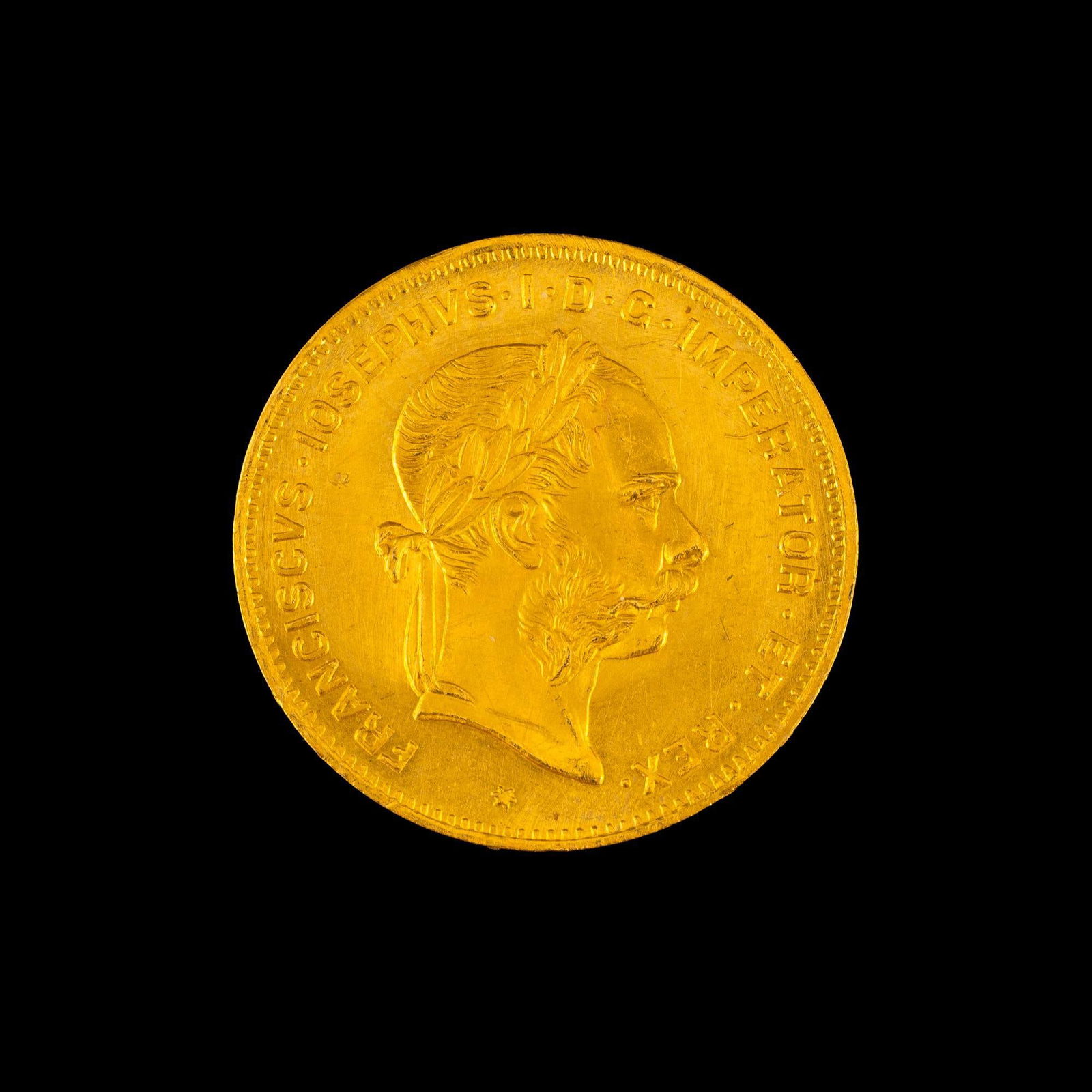 Austria 4 Florin 10 Francs Gold Coin: 1892 re-strike Austria gold, uncirculated details, with some cleaning hairlines. 3.22 grams.