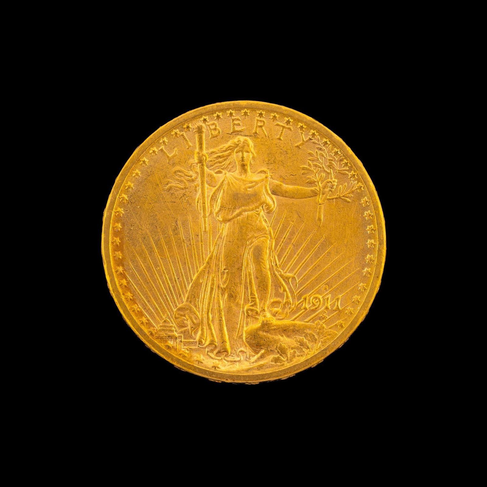 1911-S St. Gaudens $20 Gold Coin: XF with mint luster and with hairlines from polishing.