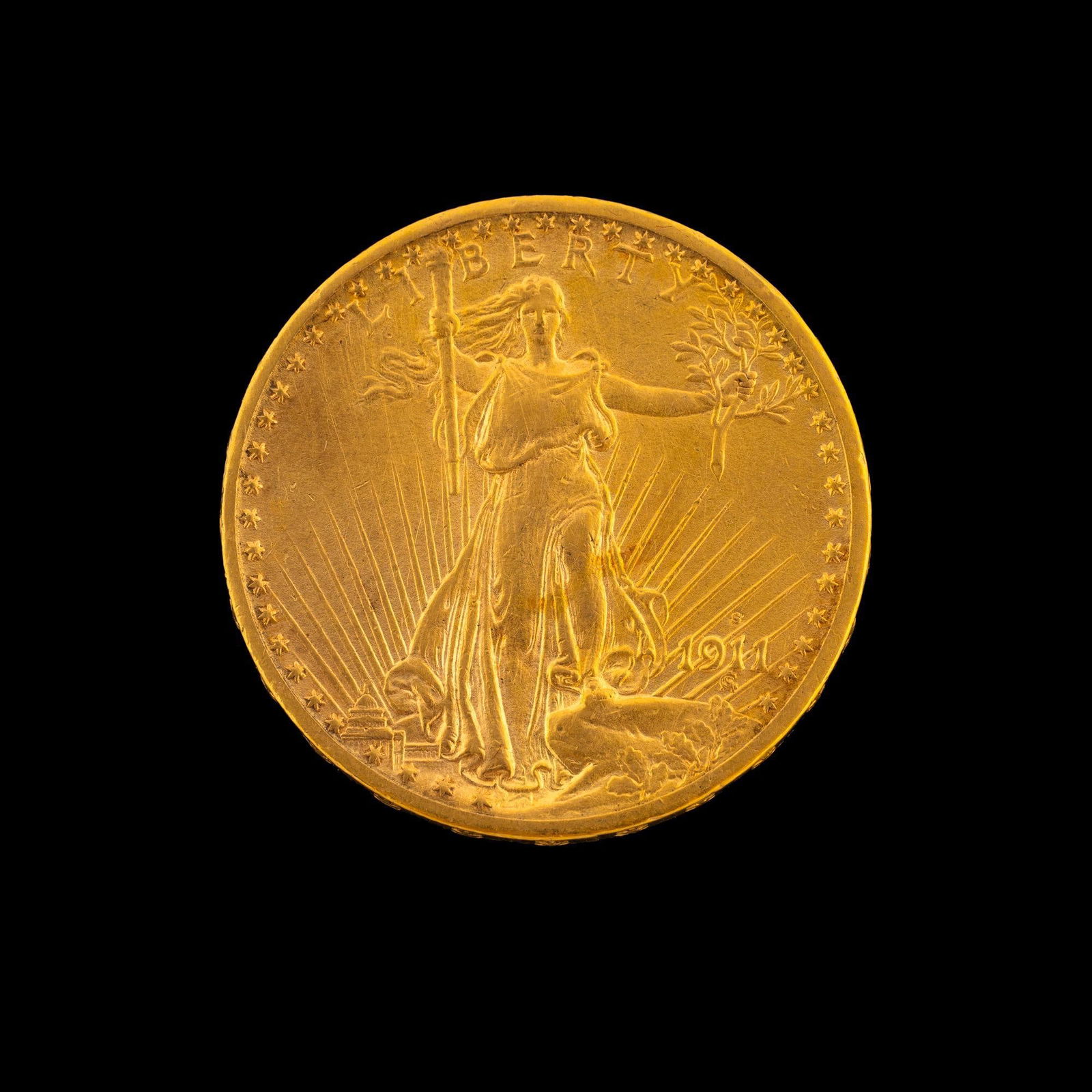 1911-S St. Gaudens $20 Gold Coin: XF to AU with mint luster and with hairlines from polishing.